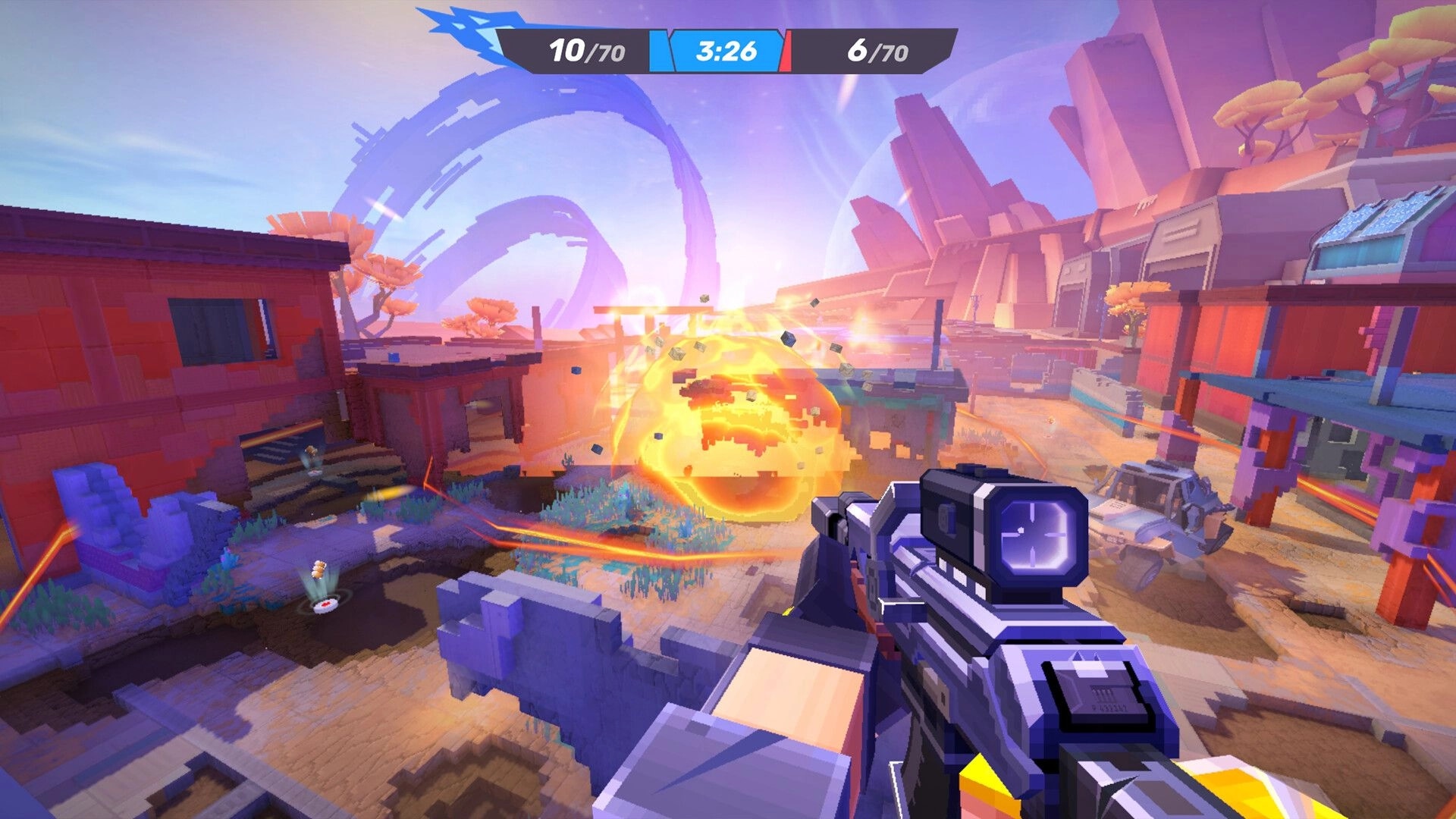 Pixel Gun 2: First-person rifle view as a huge explosion tears up a colorful desert arena map.