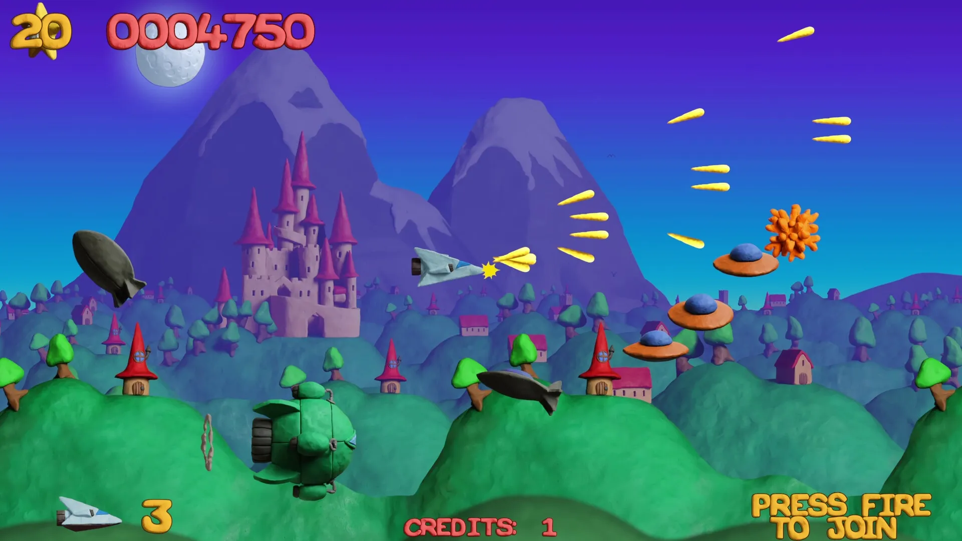 Platypus Reclayed: Spaceship firing at UFOs in a vibrant, clay-modeled landscape with castles