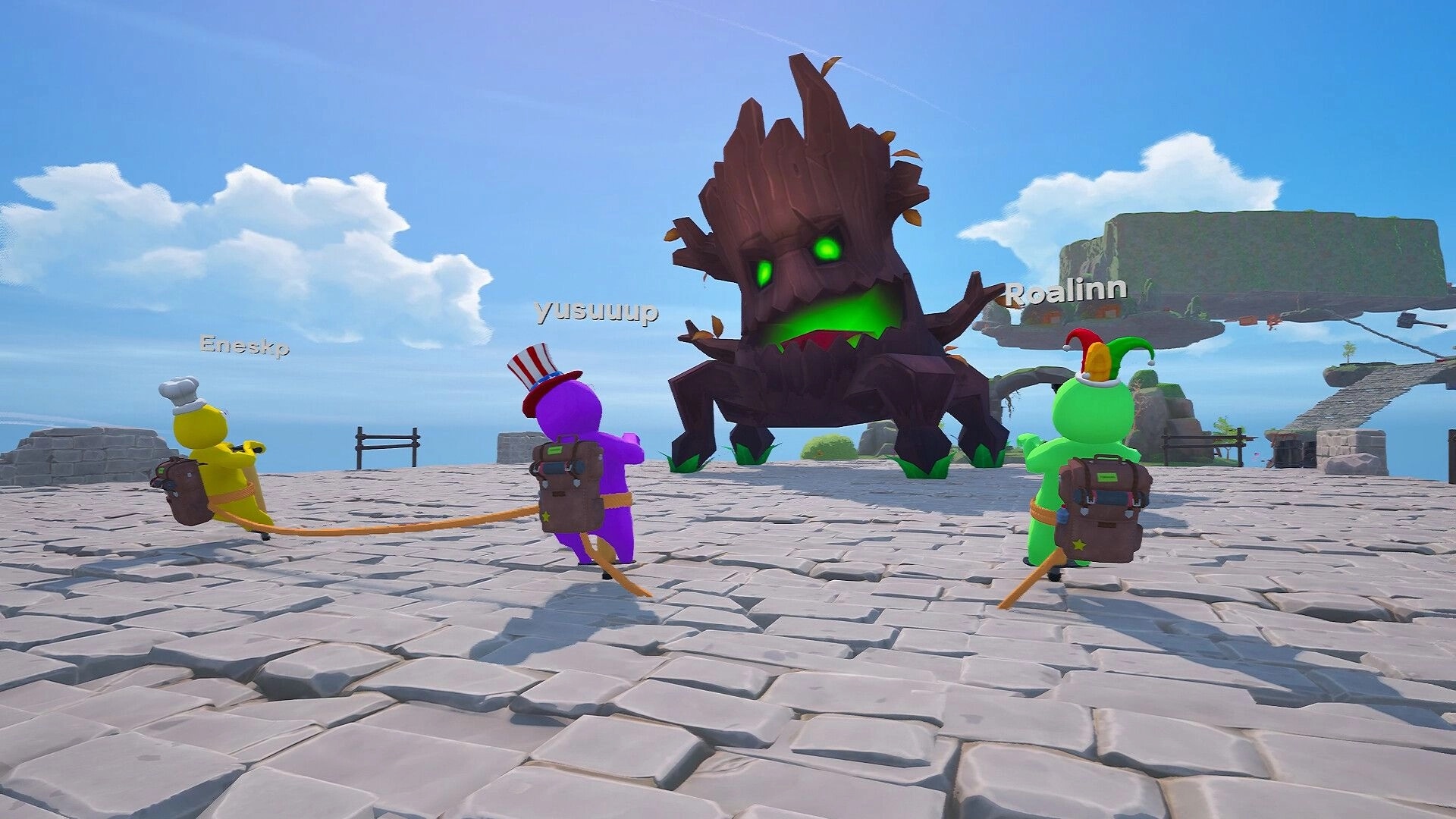 Pogo With Friends: Three pogo players face a glowing tree boss on a stone platform in the sky.