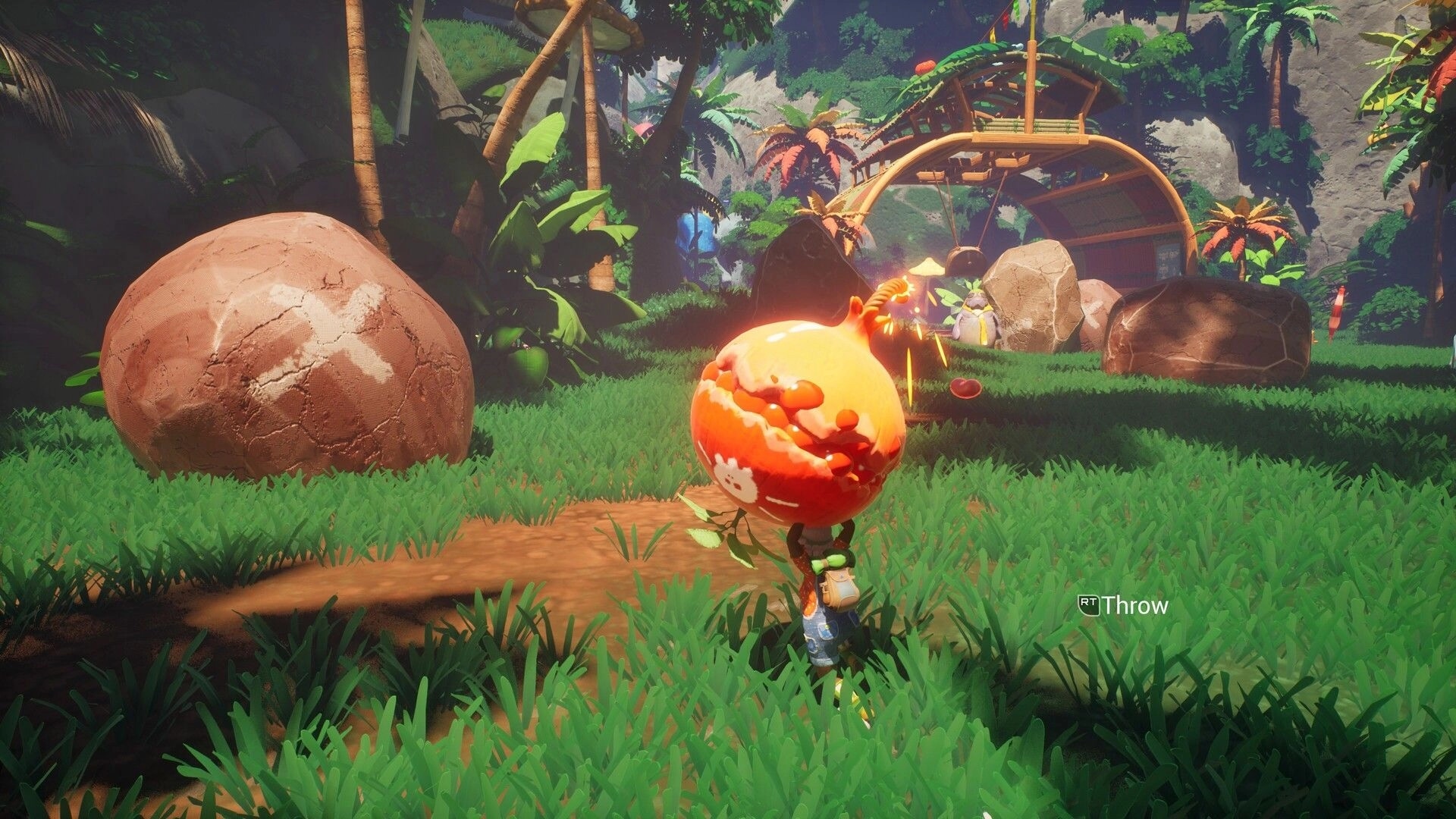 Portabellows: Player holds a giant red mushroom to throw in a lush jungle clearing by a hut.