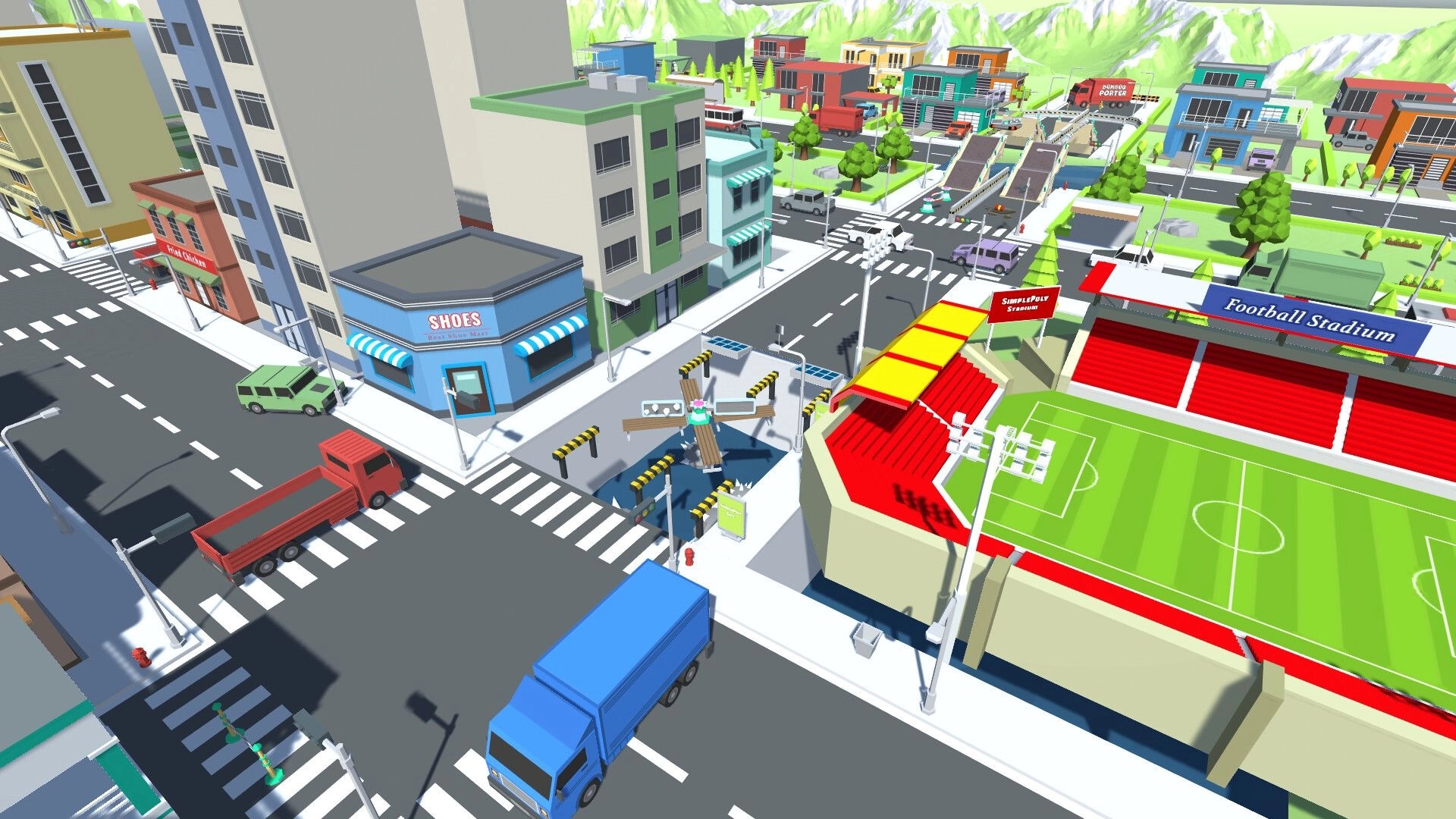 PORTERS: Aerial view of colorful cityscape with roads, parked trucks, and a football stadium nearby.