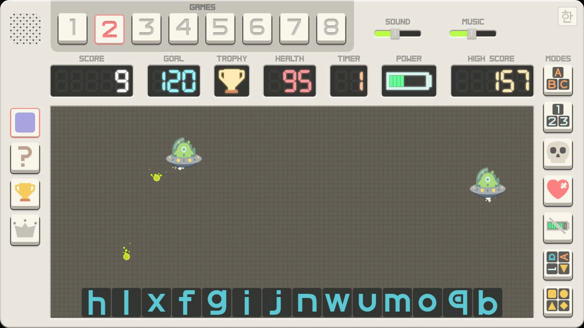 Press&Release: UFO dodging projectiles in typing mini-game with score, goal, and health displays