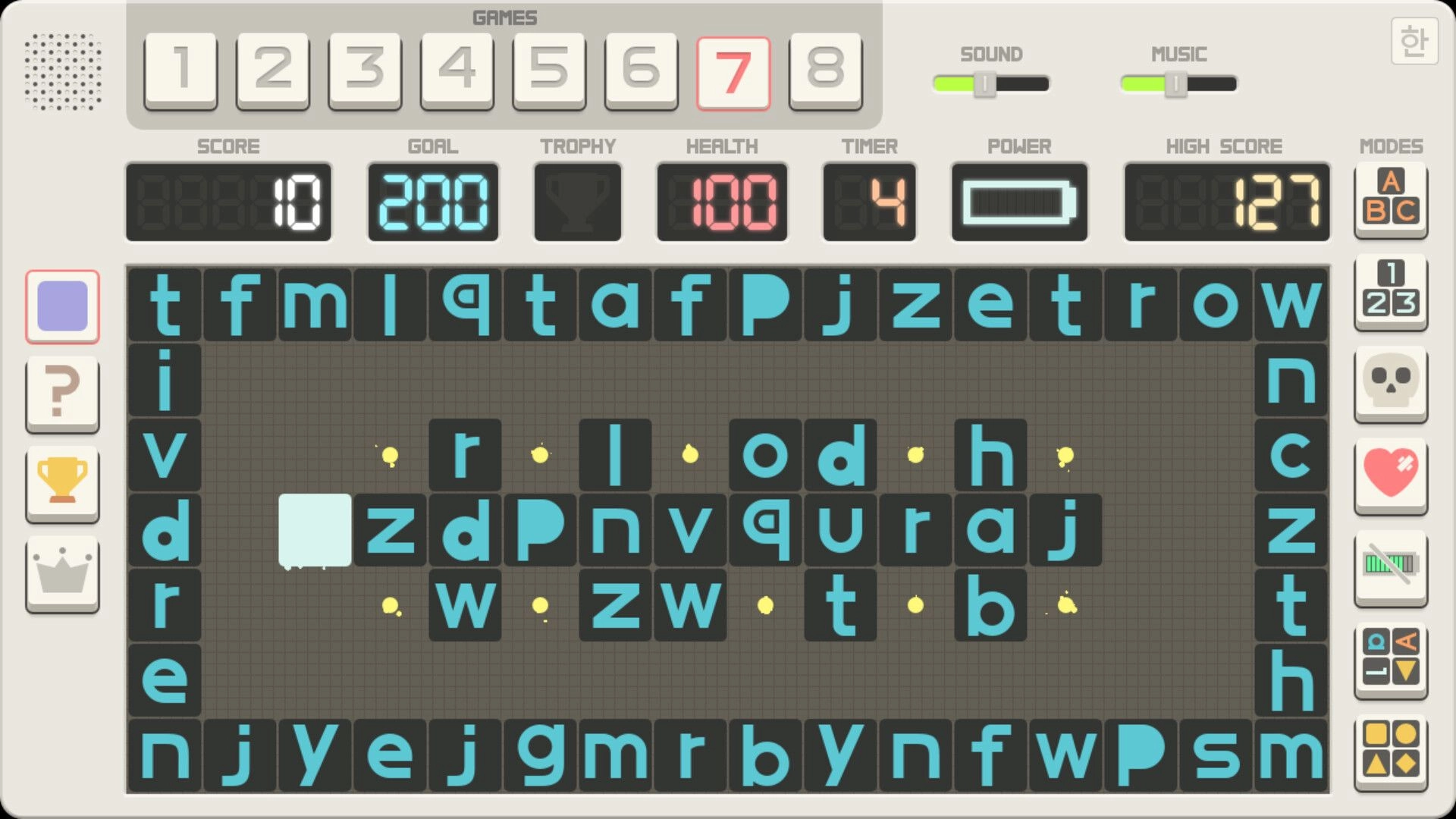 Press&Release: Typing grid with letters and score, goal, health, and timer indicators on screen