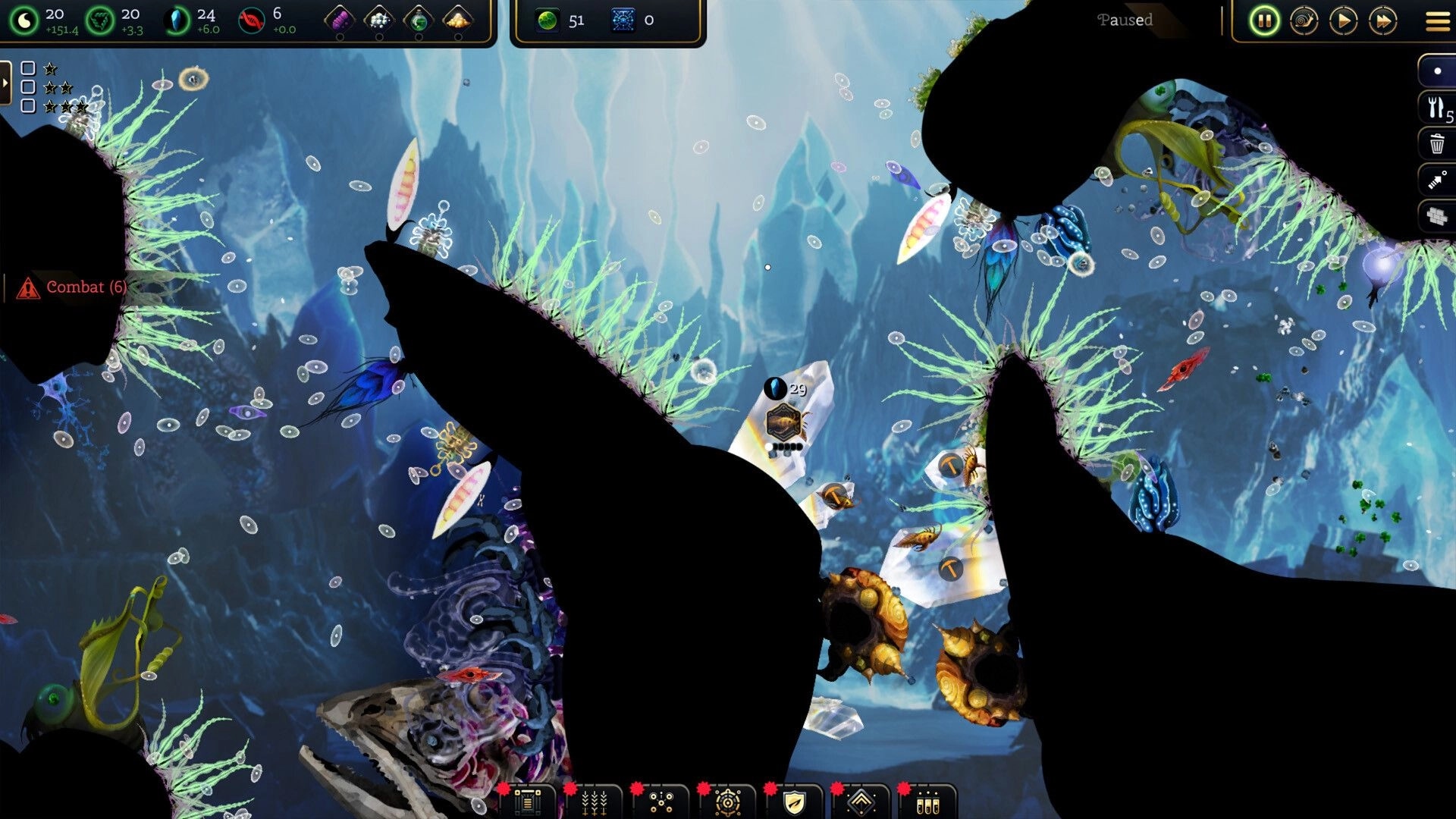 Primordial Empire: Paused combat alert over algae tunnels and drifting microbes in blue underwater caverns.