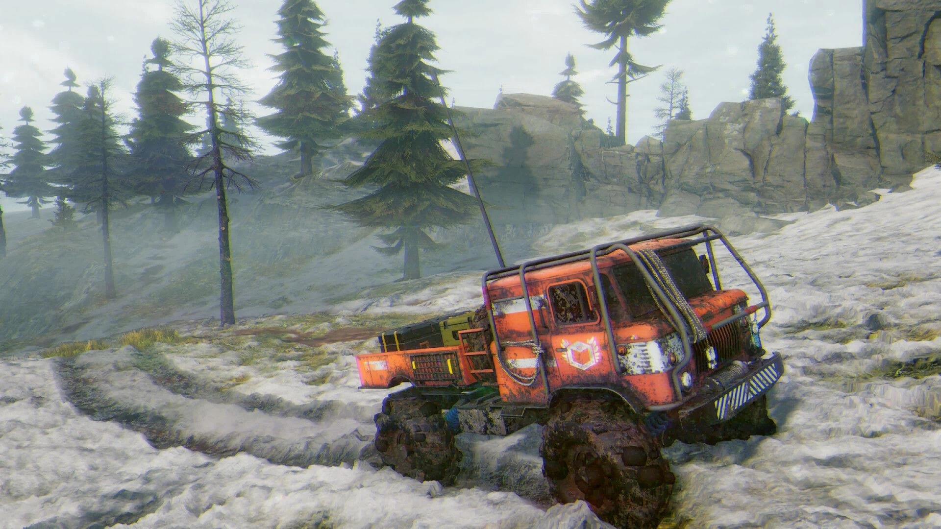 Prospice: Orange off-road truck stuck in snowdrift beside pine trees and rocky cliffs in foggy pass.