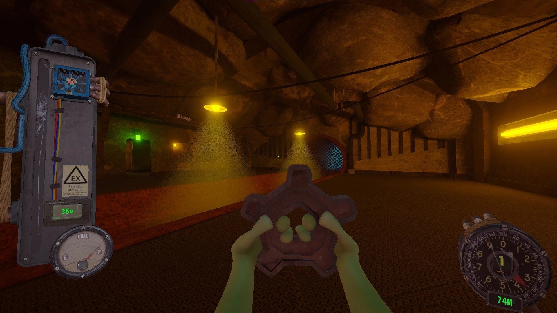 PSI: First-person view holding a metal valve wheel with fuel gauge UI in a lit rocky tunnel.