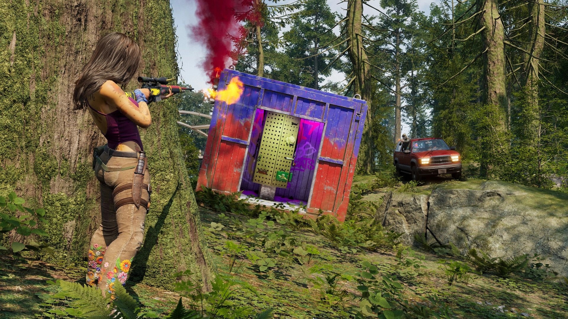 PUBG: Player aims rifle at a burning supply crate with red smoke in a dense forest clearing nearby.