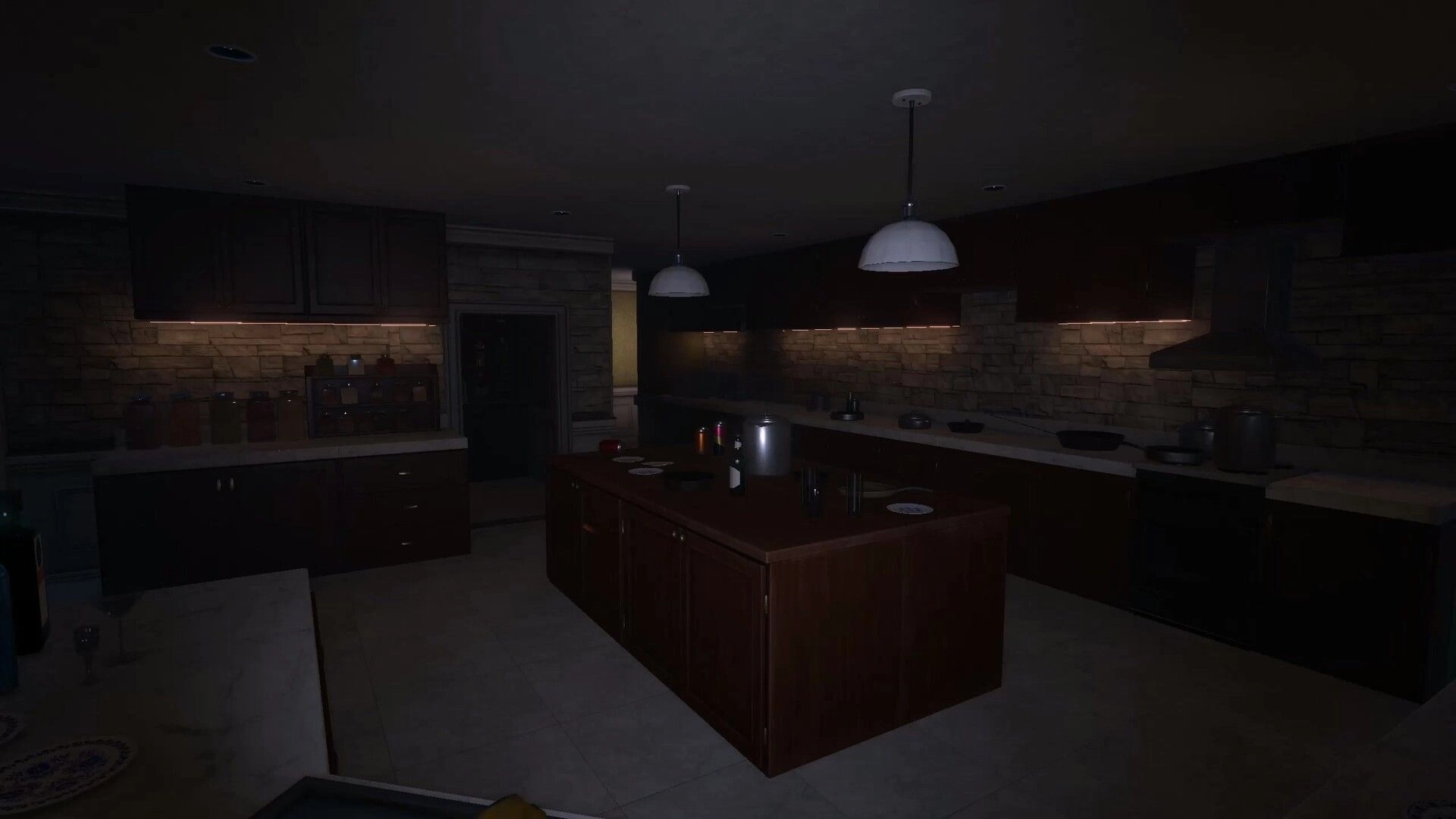 QUIET: Dim kitchen with central island, hanging lamps, and cluttered counters in a dark house interior.