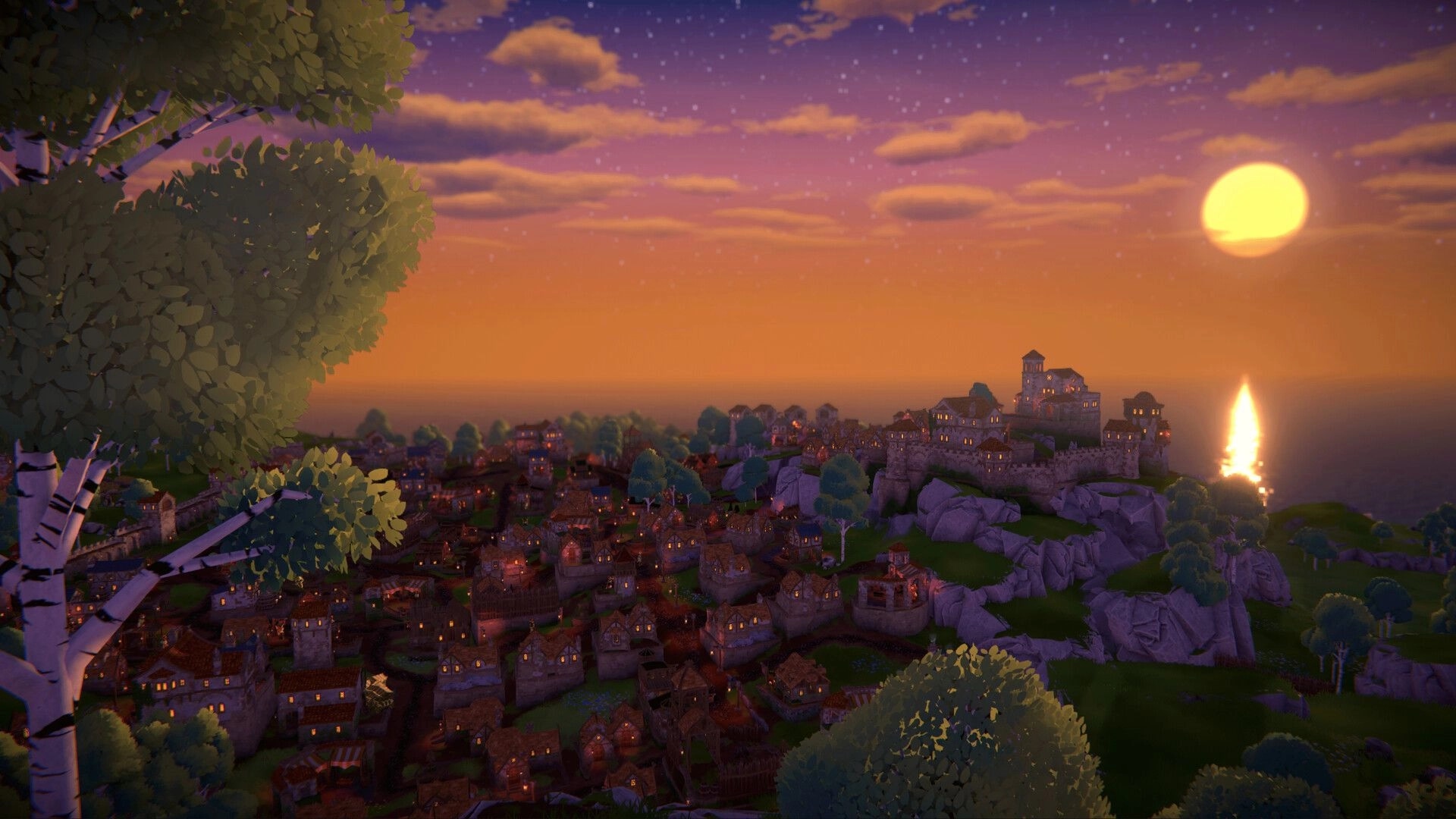 RAEV: Sunset view of a sprawling medieval town with lit windows nestled along a rocky coastline.