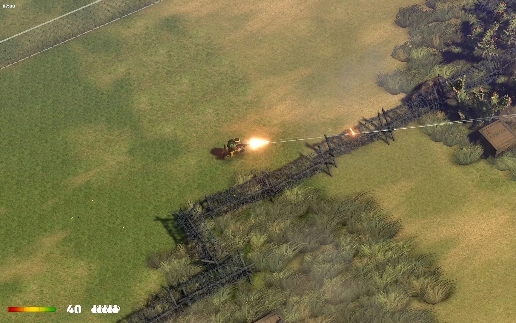 RANGER COMMANDO: Commando fires at enemies near barbed wire fence in grassy terrain with HUD health and ammo.