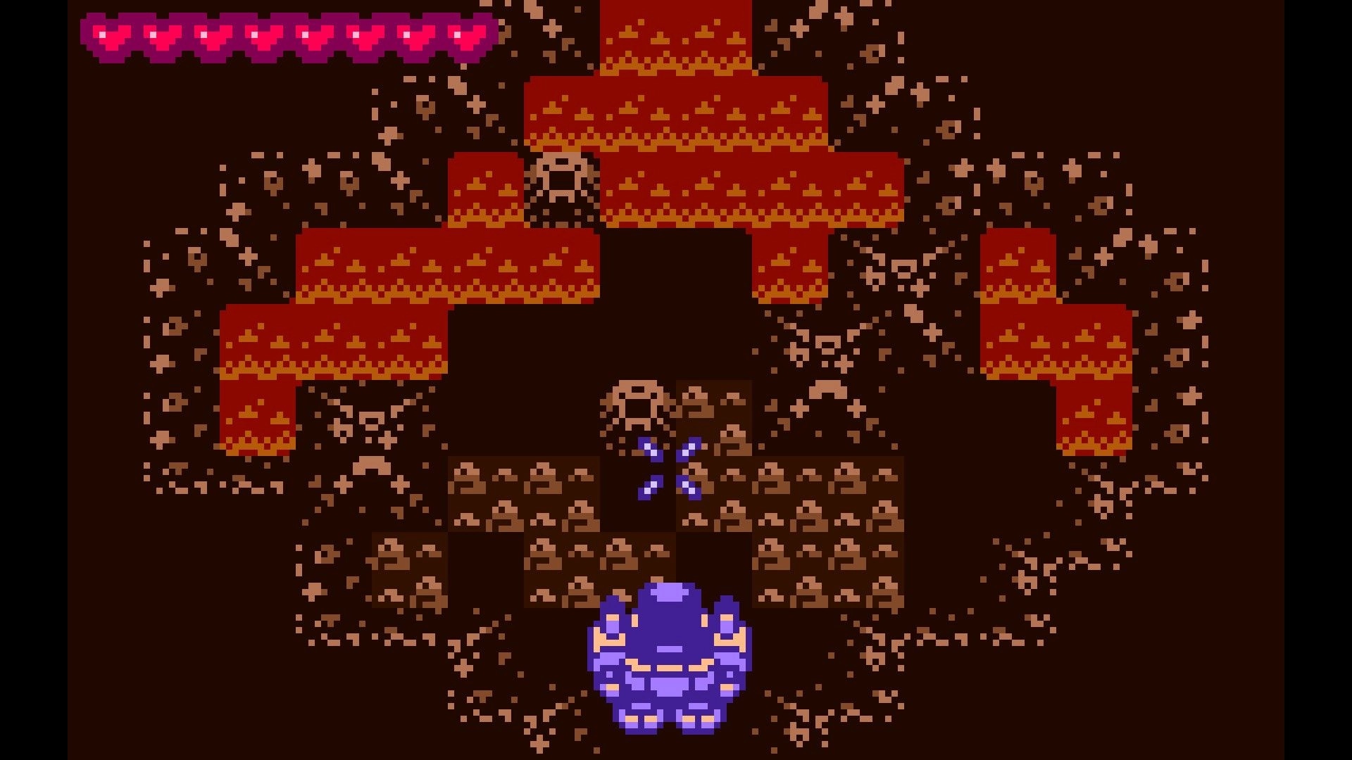 Ratcheteer DX: Player character battling a large blue boss in pixelated underground cavern environment