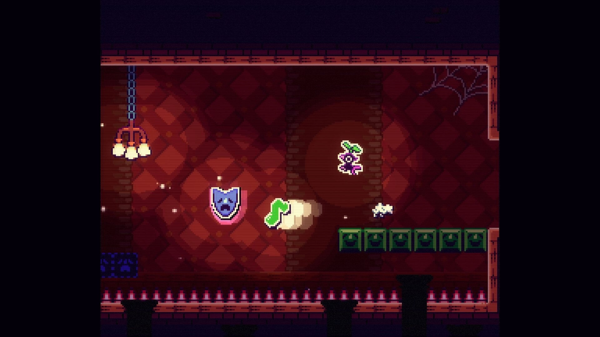 RavenStar: Player sprite mid-jump past shield and boot icons in a red room with spikes and platforms.