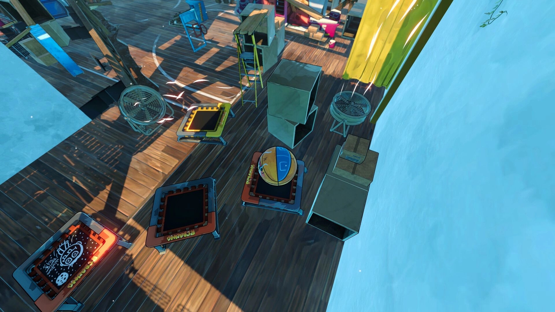 Rebounce: Basketball perched on a spring pad amid trampolines, fans, and boxes on wooden deck.