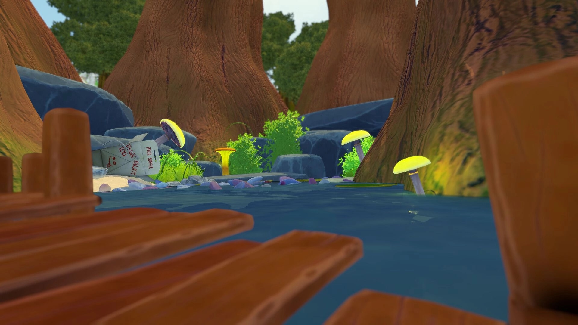 Reel Tiny: Low view from a wooden raft drifting past mushrooms and rocks in a forest creek.