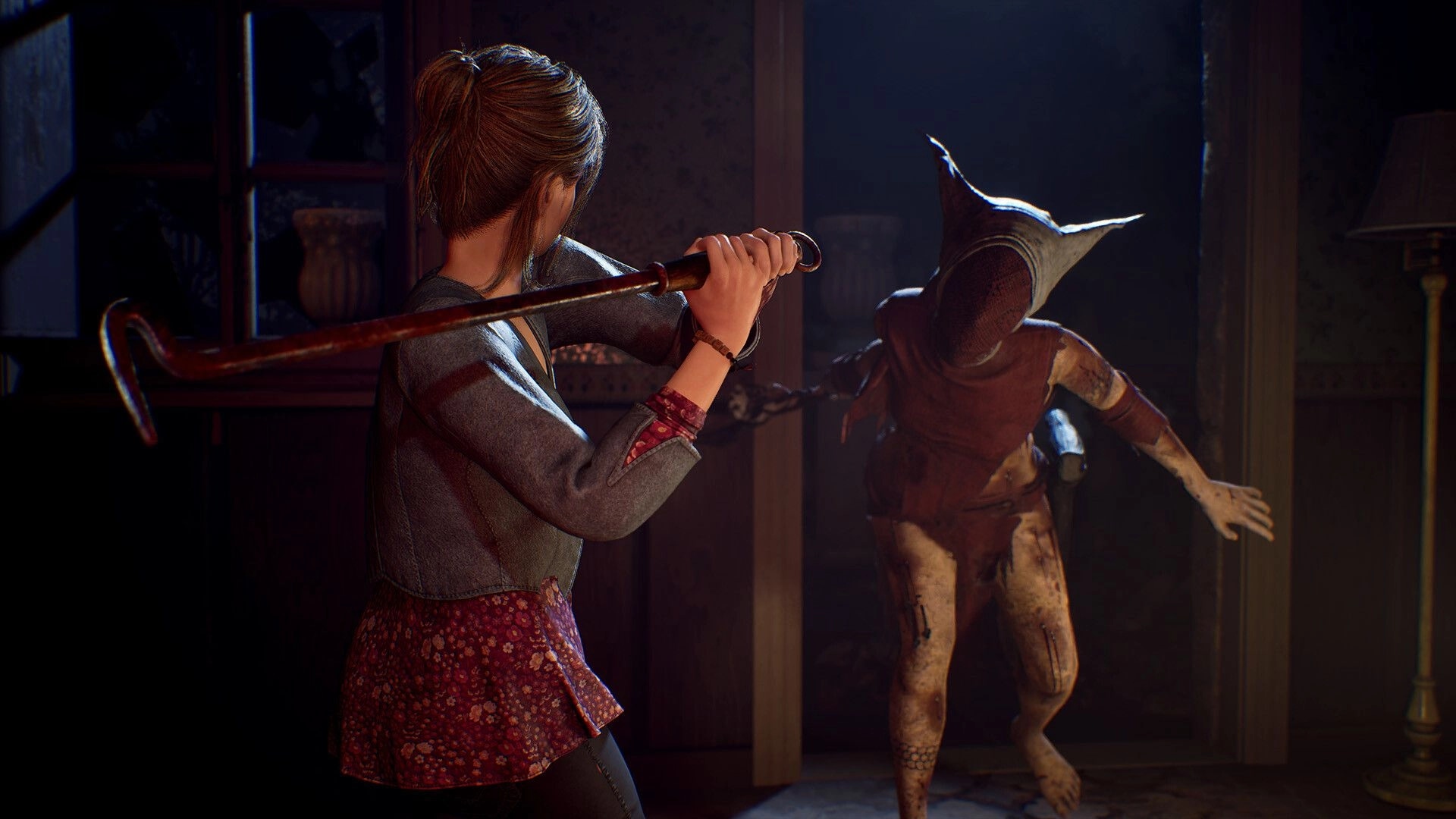 Remothered: Woman raises a crowbar to strike a hooded attacker in a dim, dusty room doorway.
