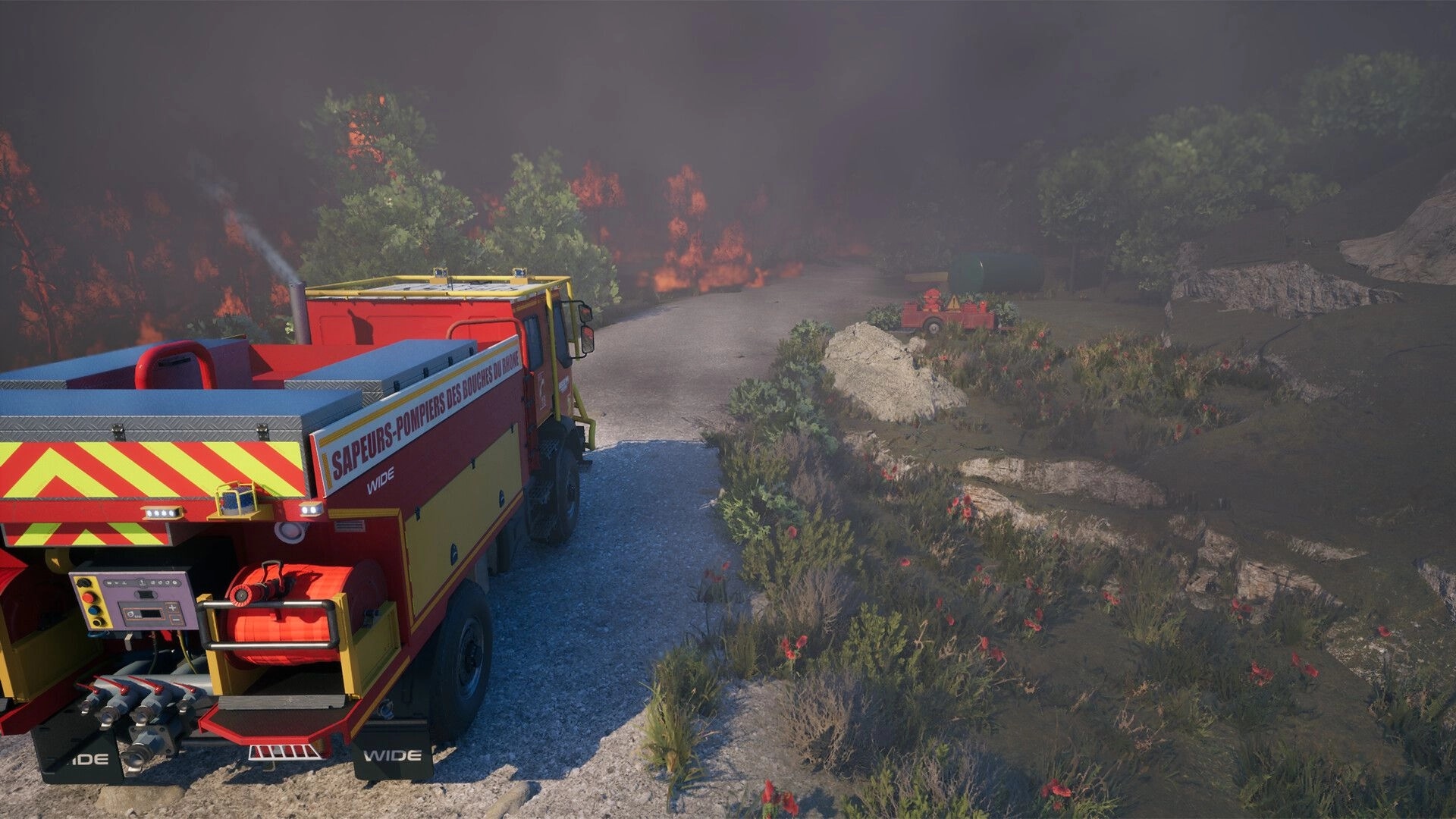 Rescue Ops: Fire engine parked on dirt road facing wildfire smoke and flames in a wooded hillside.
