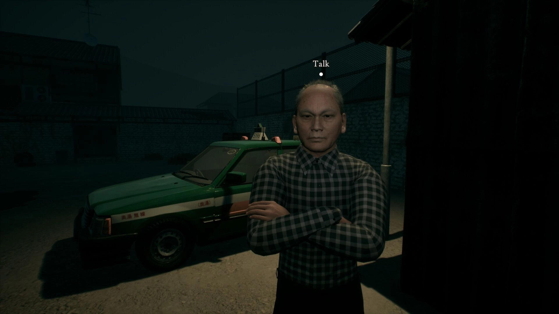 Road to Jukai: Talk prompt over stern man by green taxi in a dim rural lot at night.