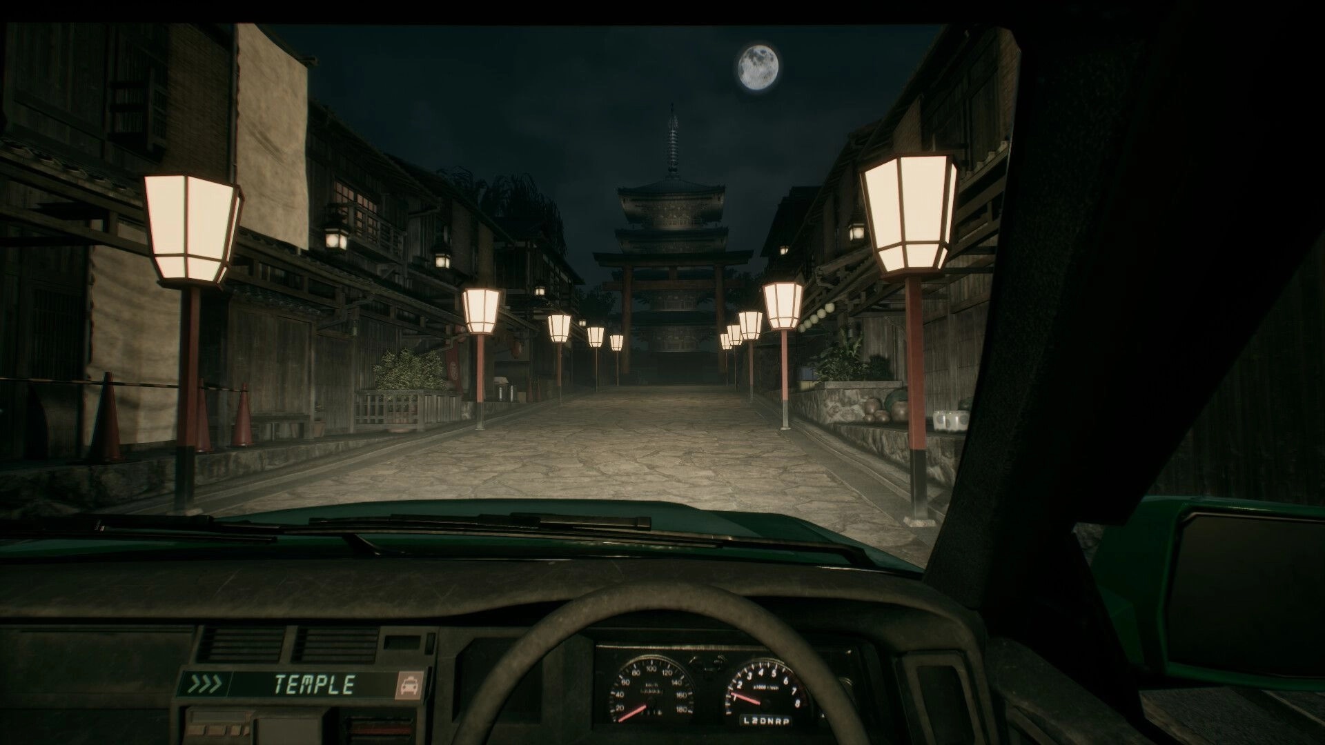 Road to Jukai: Driving toward a temple gate from taxi dashboard view on a lantern-lit street at night.