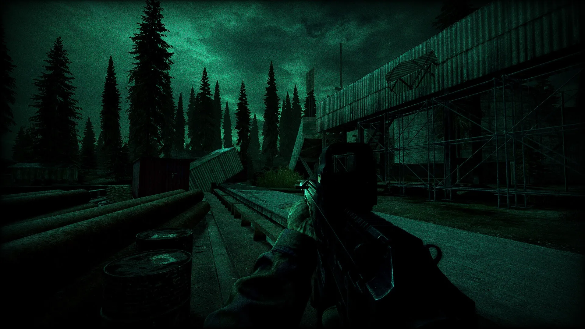 Road to Vostok: Player aiming rifle in dark, forested industrial area with scattered containers and pipes