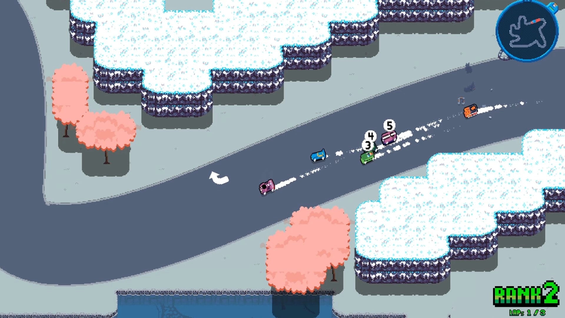 RoadOut: Top-down racing with colorful cars on snowy track, rank displayed as 2, laps 1 of 3