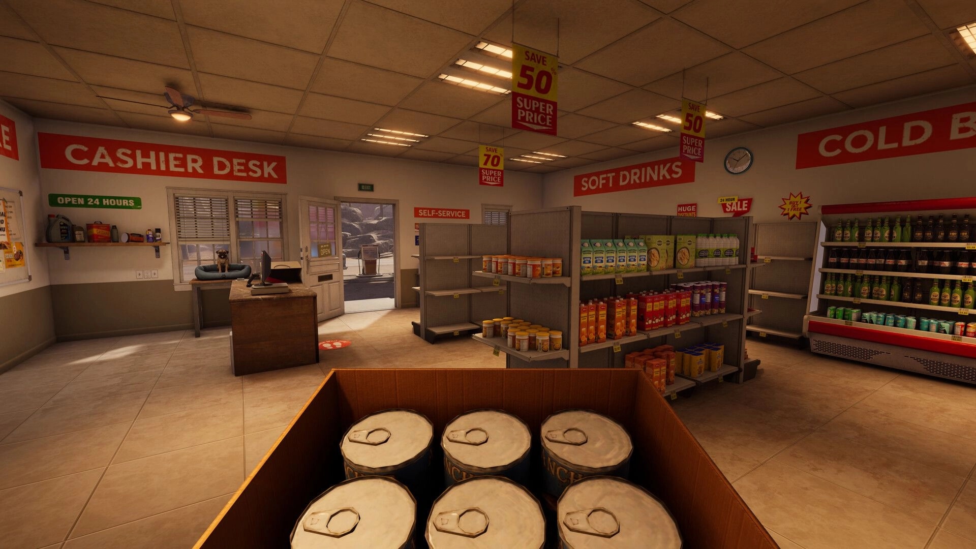 Roadside Research: Box of cans in gas station aisle with shelves of snacks, drinks, and cashier desk