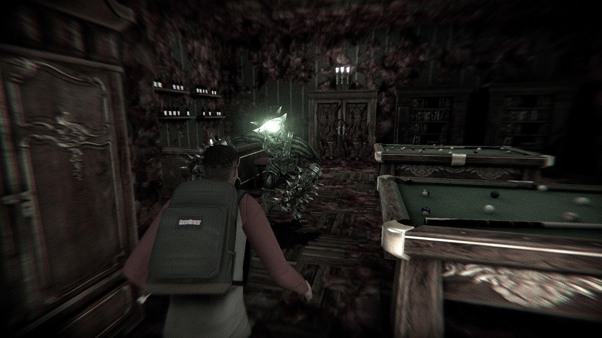 Rogue Mansion: Player confronts glowing enemy in dark, eerie room with pool table and bookshelves