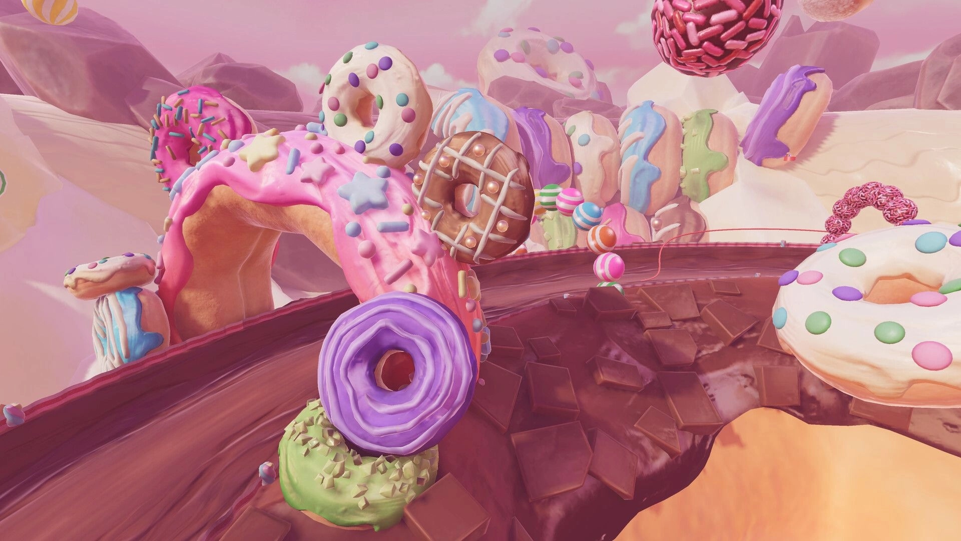 Rollin' Rascal: Curving chocolate track with donut hoops and candy poles in a pastel dessert world.