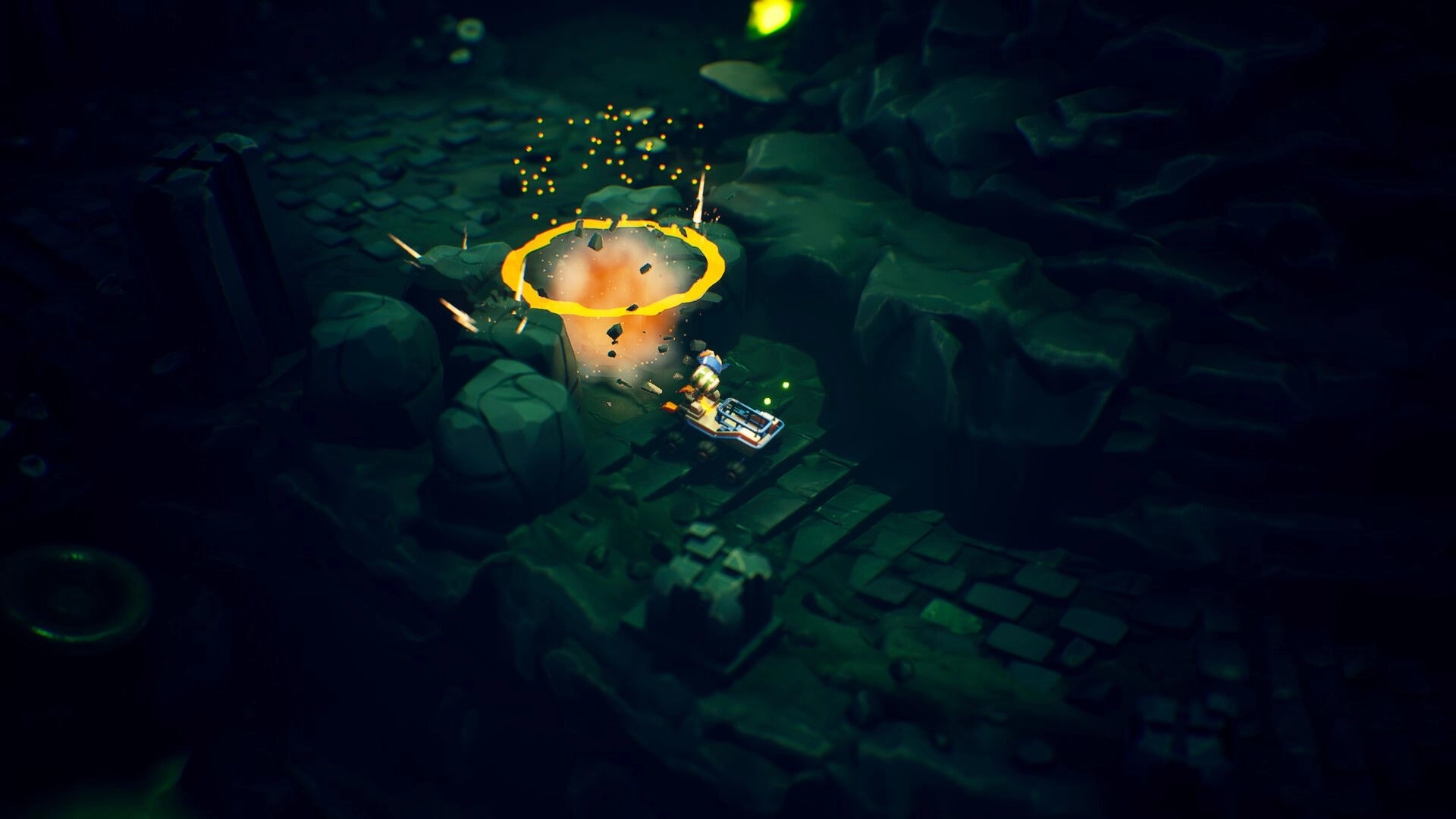 Rover’s Tale: Rover triggers a fiery explosion on a rocky path in a dim, green-lit cavern ruins.