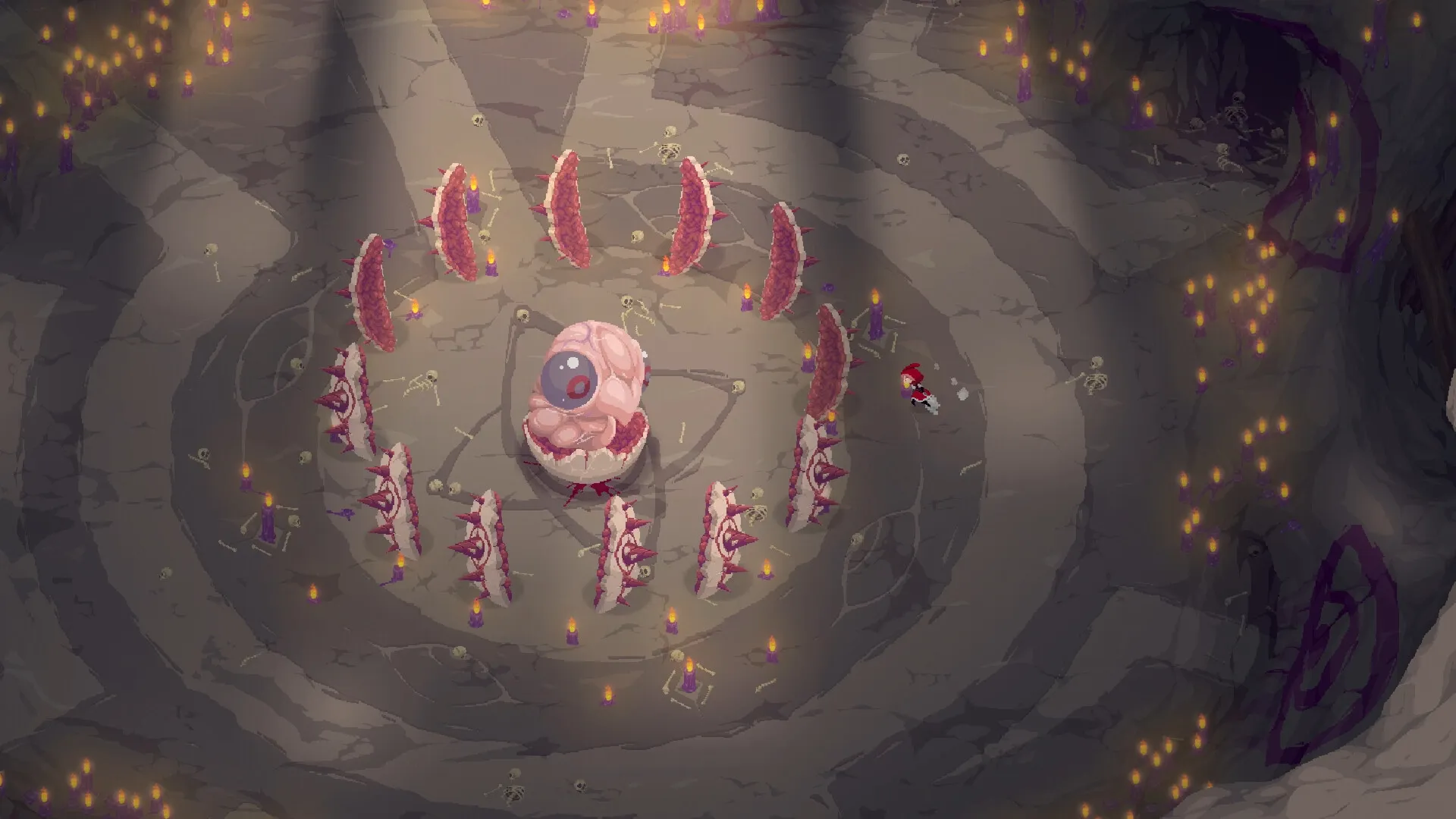 Rubinite: Ruby confronts a giant eye boss surrounded by spikes in a dimly lit cavern arena.