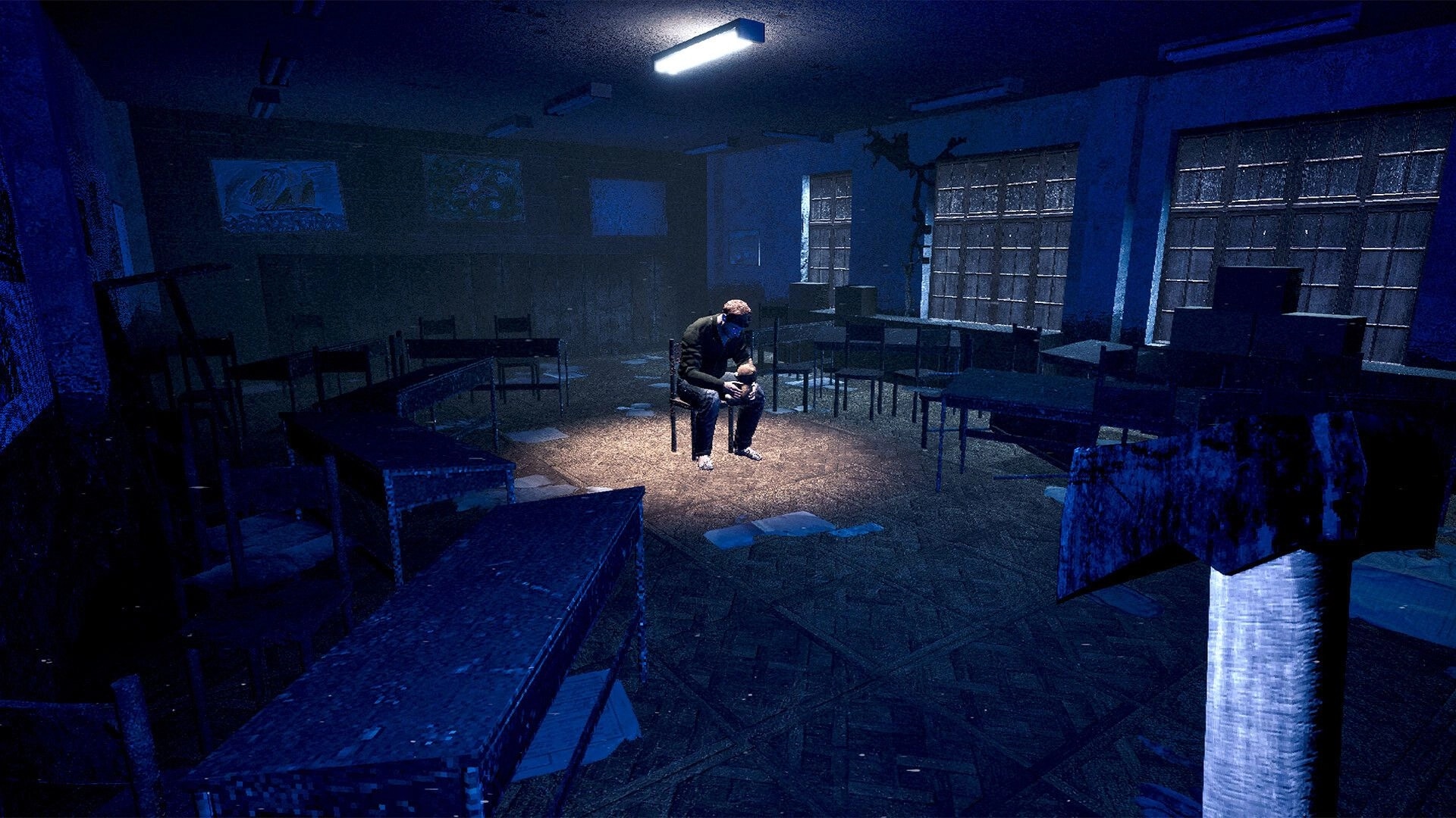 Saint of Chains: Lone man sitting in dark, abandoned classroom with axe in foreground under blue light