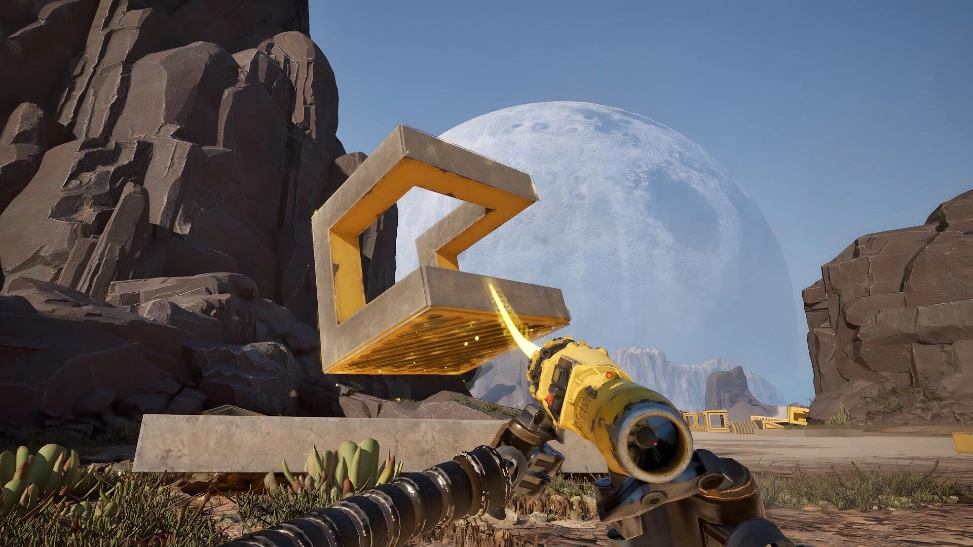Salvation Denied: Gravity gun lifting a huge C-shaped block in a rocky desert under a giant moon.