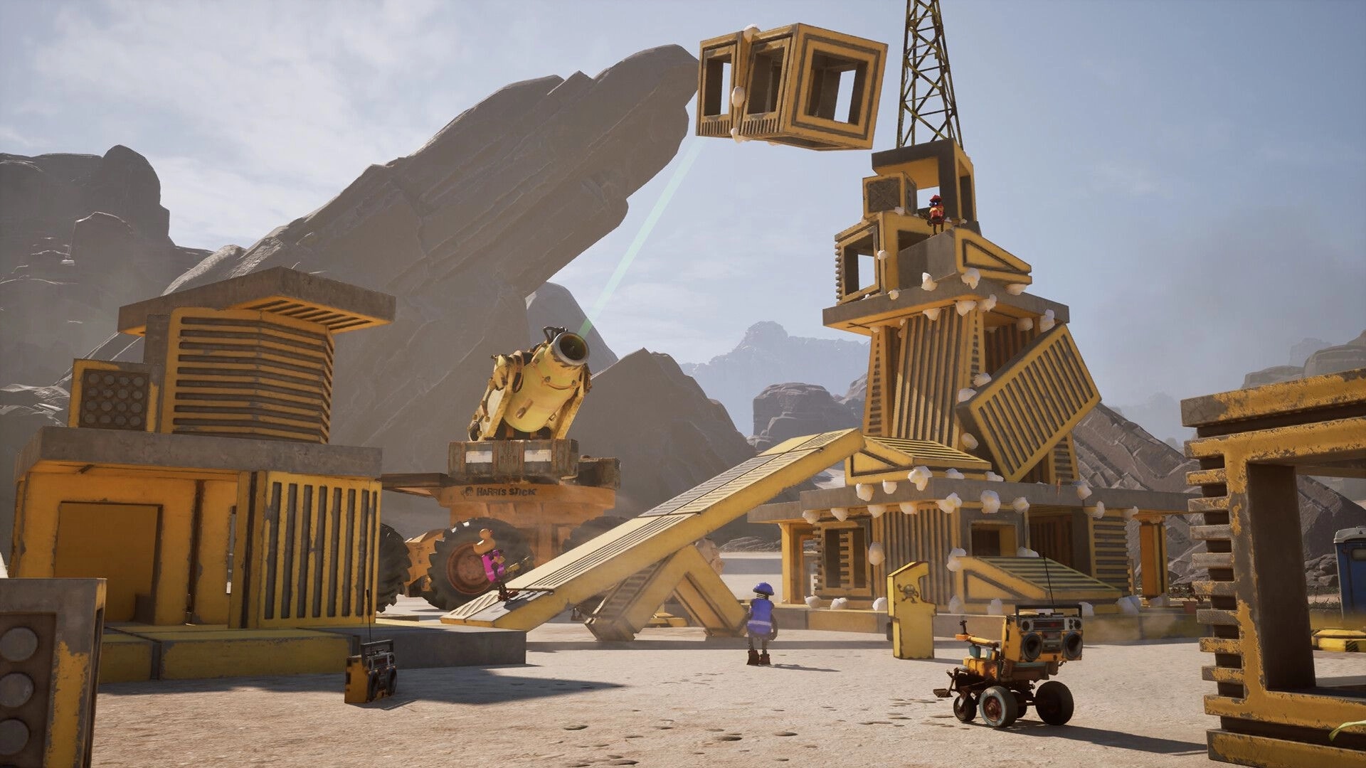 Salvation Denied: Crane lifts a cabin module over a wobbly stack of containers in desert yard.