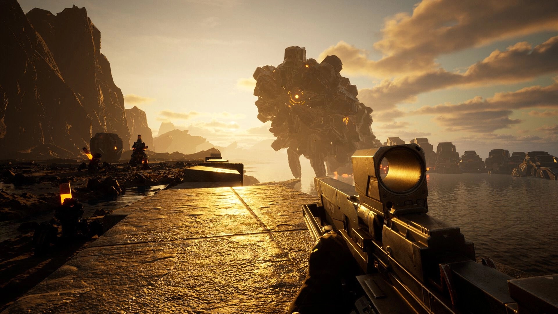 Sand Eaters: First-person rifle aim at towering mech on a sunlit coastal causeway at dusk.