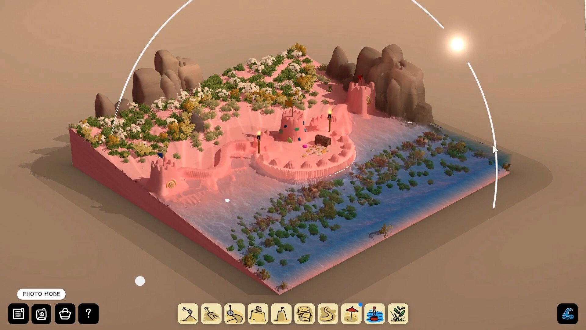 Sandcastle: Photo mode view of sand forts by tide pool, with bottom toolbar and camera arc overlay.