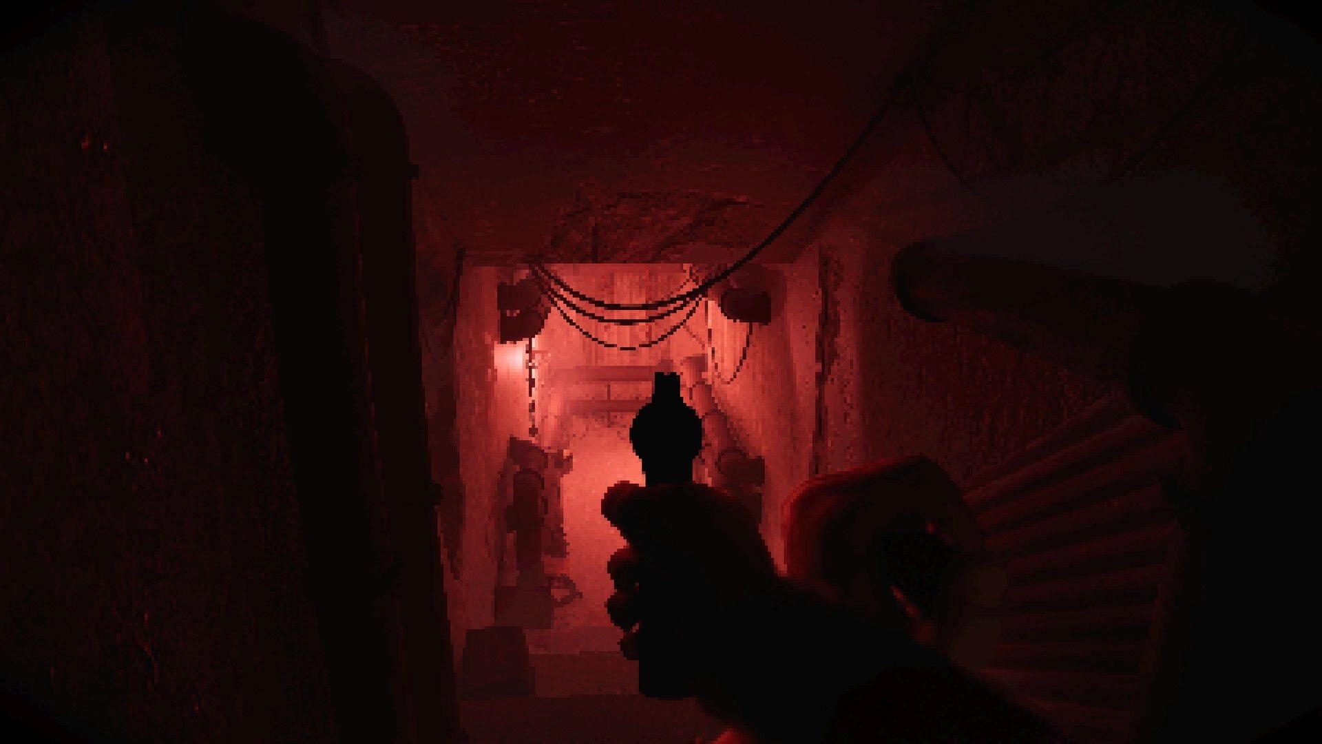 Satanic: First-person view holding a gun in a dimly lit red corridor of a cult's underground bunker