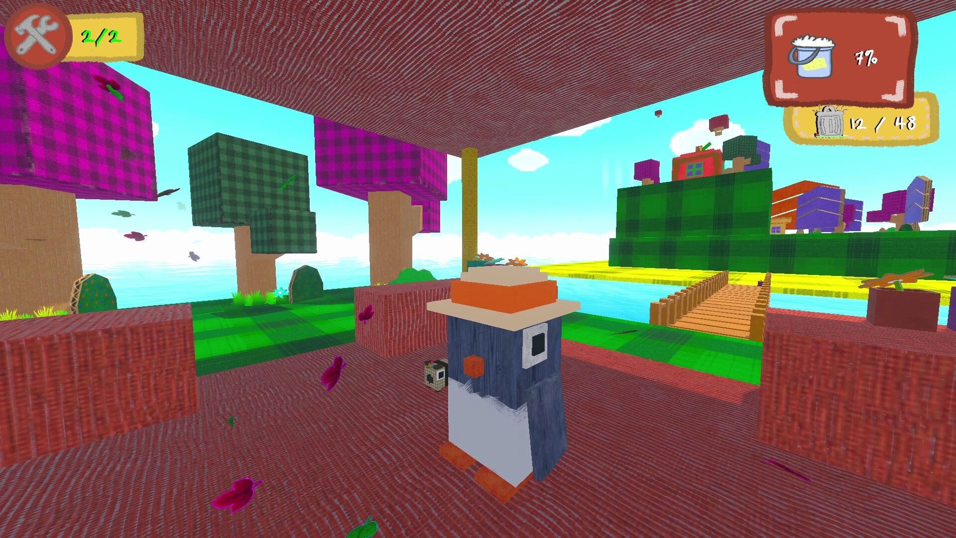 Scrub Dudes: Penguin character exploring colorful cardboard world with trees and a wooden bridge