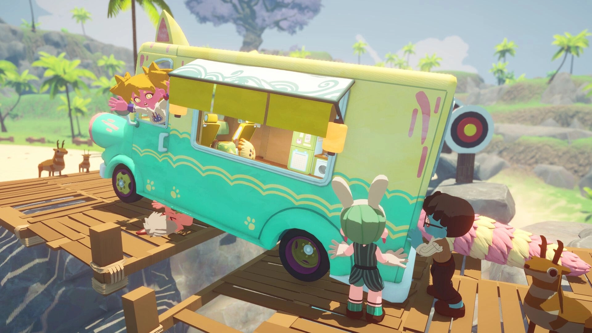 Seikyu Let’s Go!: Friends push a campervan on a wooden bridge in a sunny tropical valley.