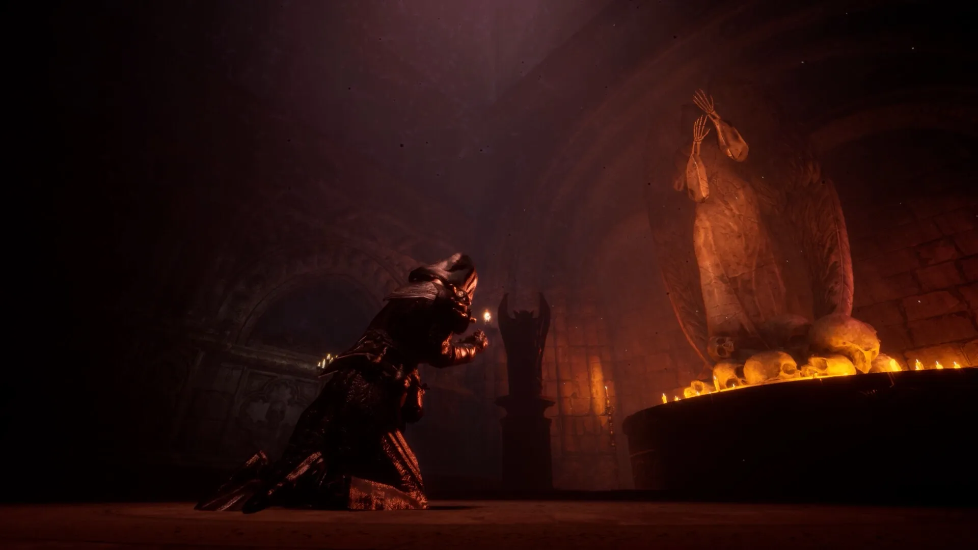 SERAPH: Hooded character kneels before eerie statue surrounded by candles and skulls in dark chamber