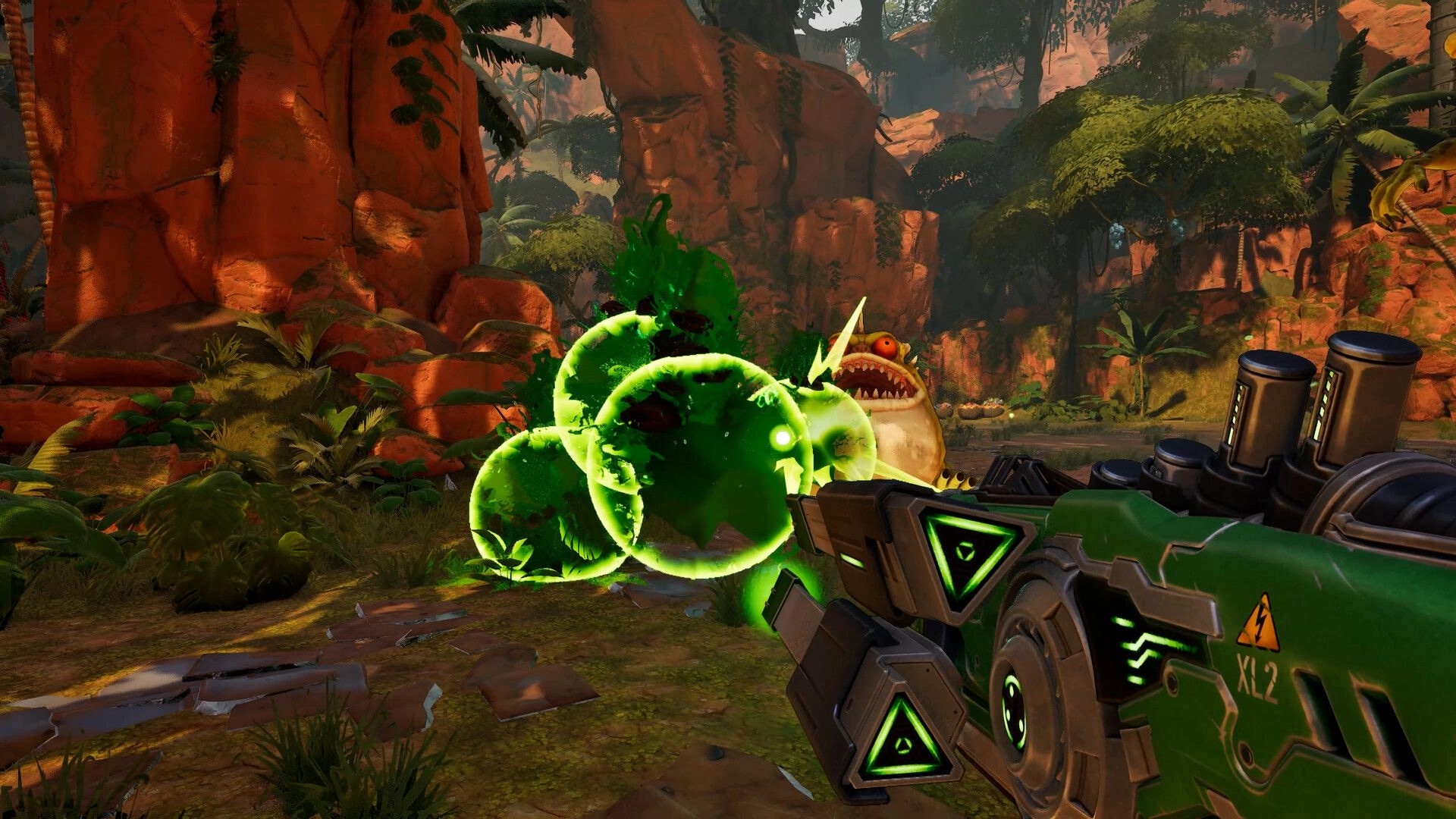 Serious Sam: Firing a green sci-fi cannon at a spitting monster in a lush red canyon jungle arena.