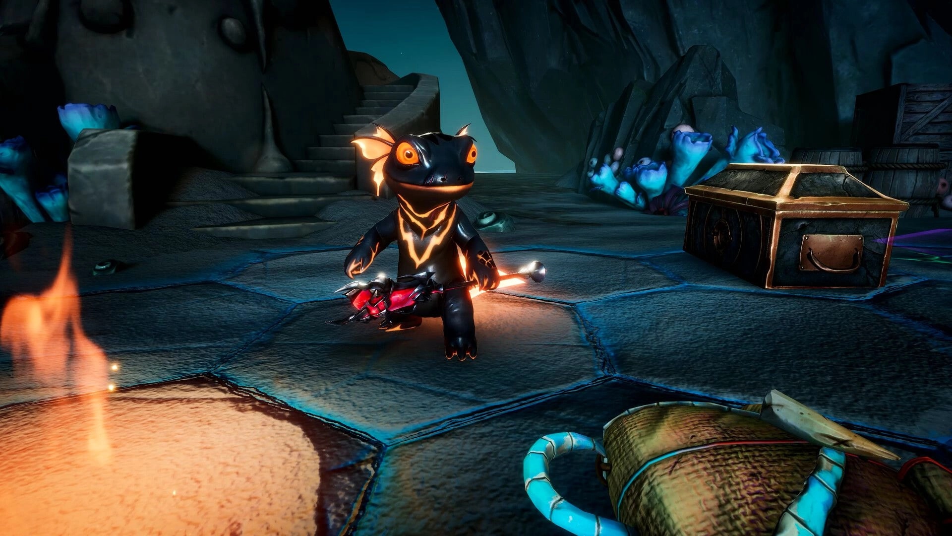 Shadowstone: Glowing salamander-like hero holds spiked mace on stone tiles in cavern camp area.