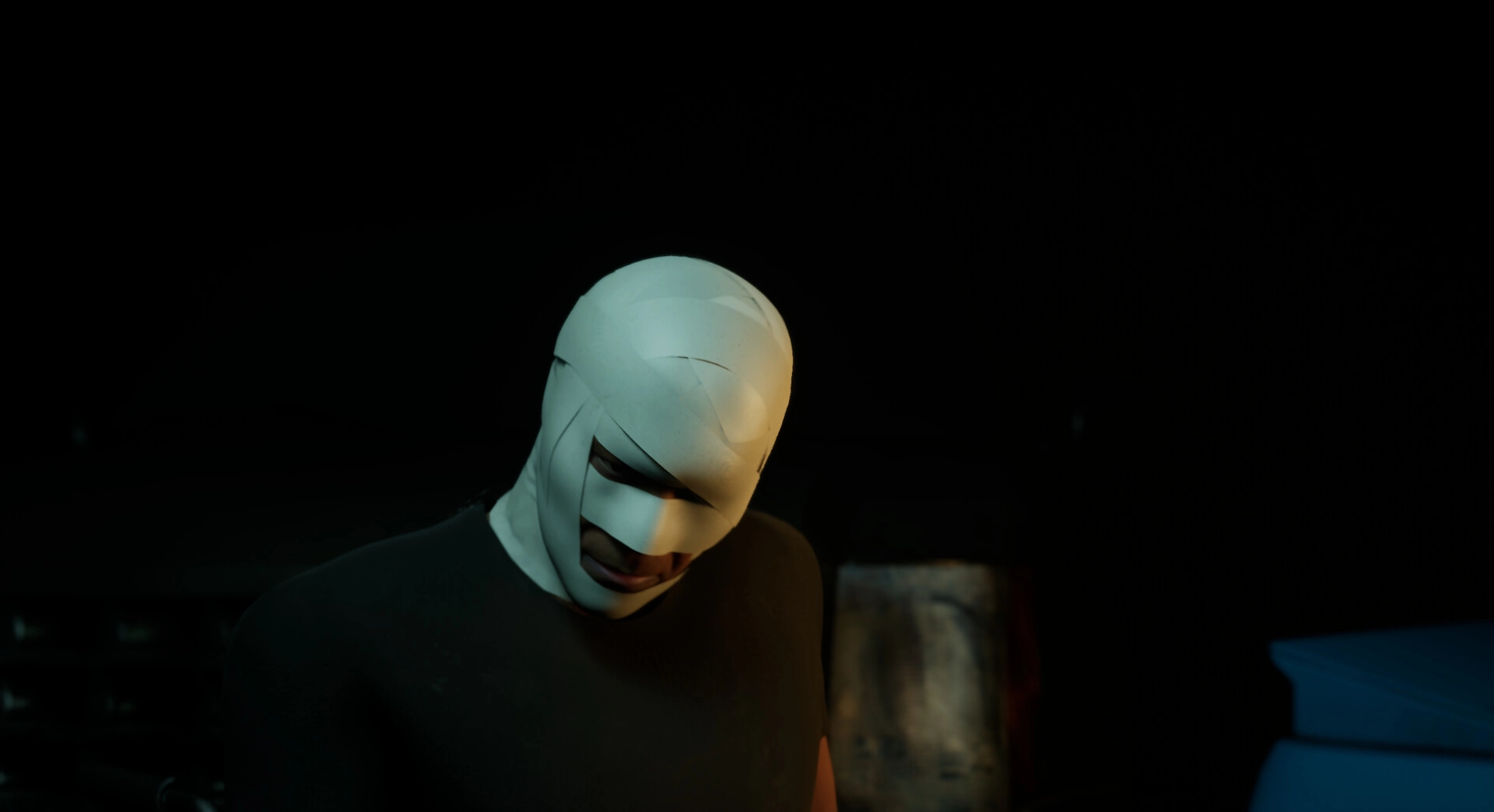 SHOCK: Masked figure in a dimly lit room, surrounded by shadows and mysterious objects