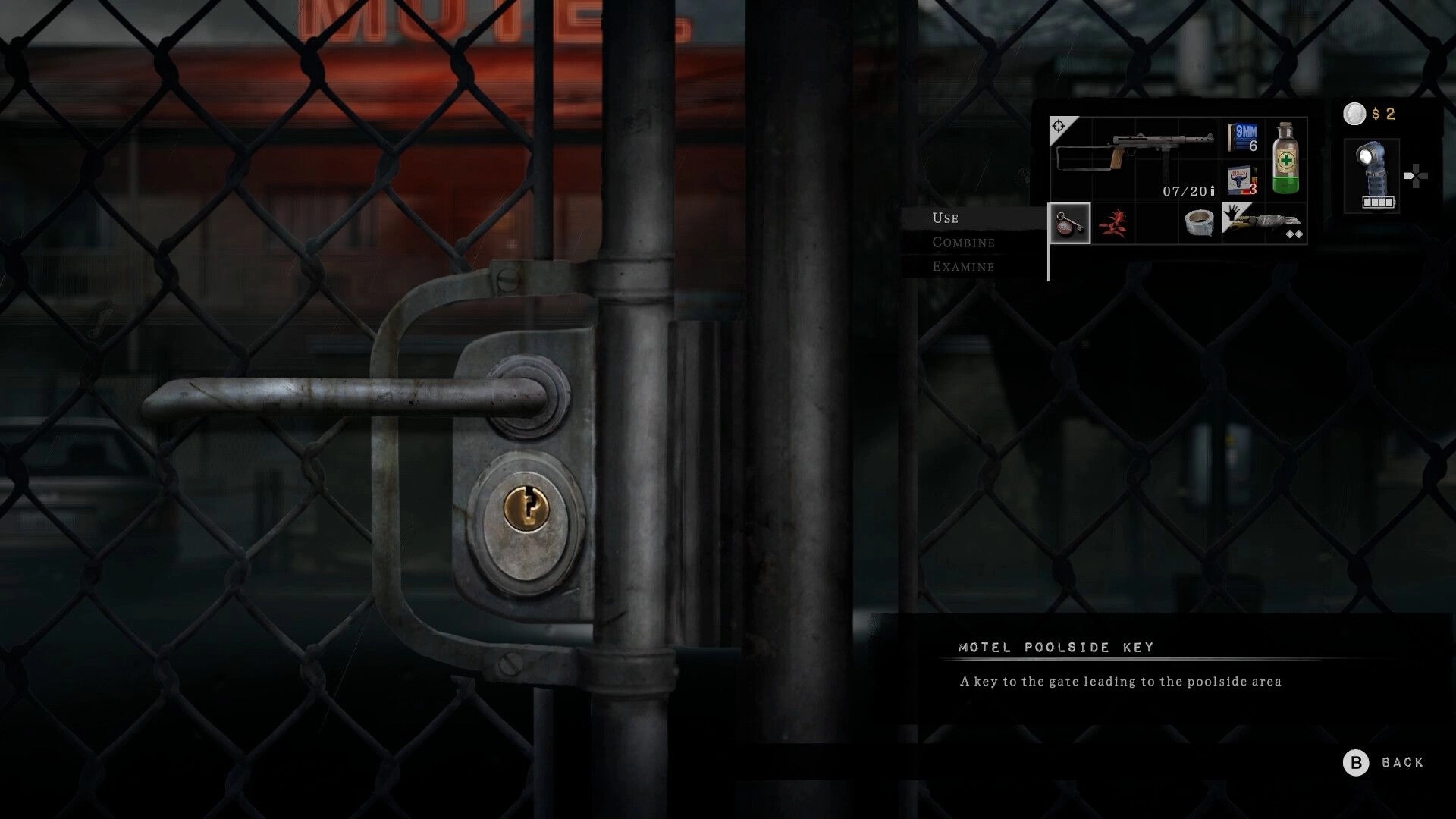 Silver Pines: Inventory open on motel poolside key beside a locked chain-link gate in rain at night.
