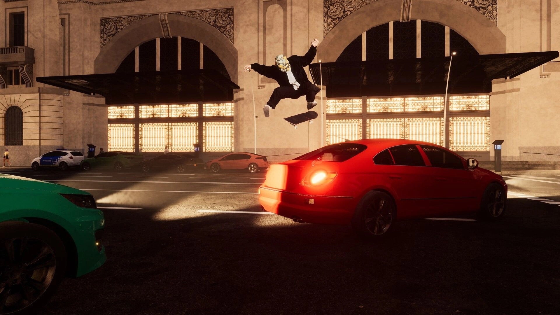 Skate Style: Skater hits a high kickflip over a red car on a lit city street outside grand arches.