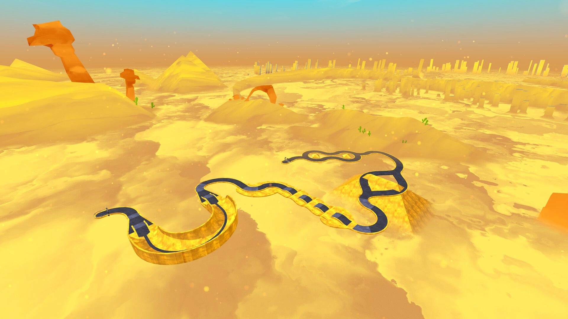 Slip & Skid: Aerial view of winding racetrack set in a vast, golden desert environment with pyramids.