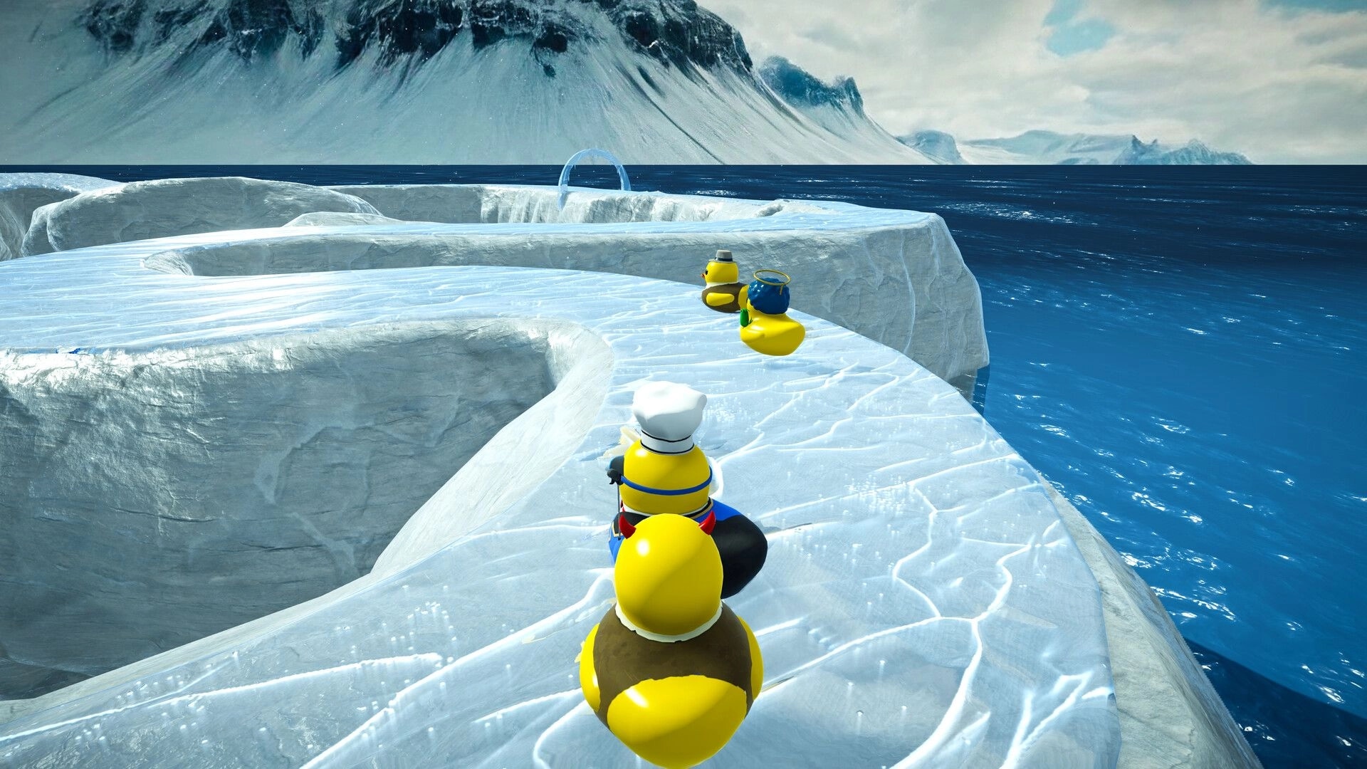 Slowly Sliding Ducks: Yellow ducks sliding on icy waterpark track near ocean with snowy mountains nearby