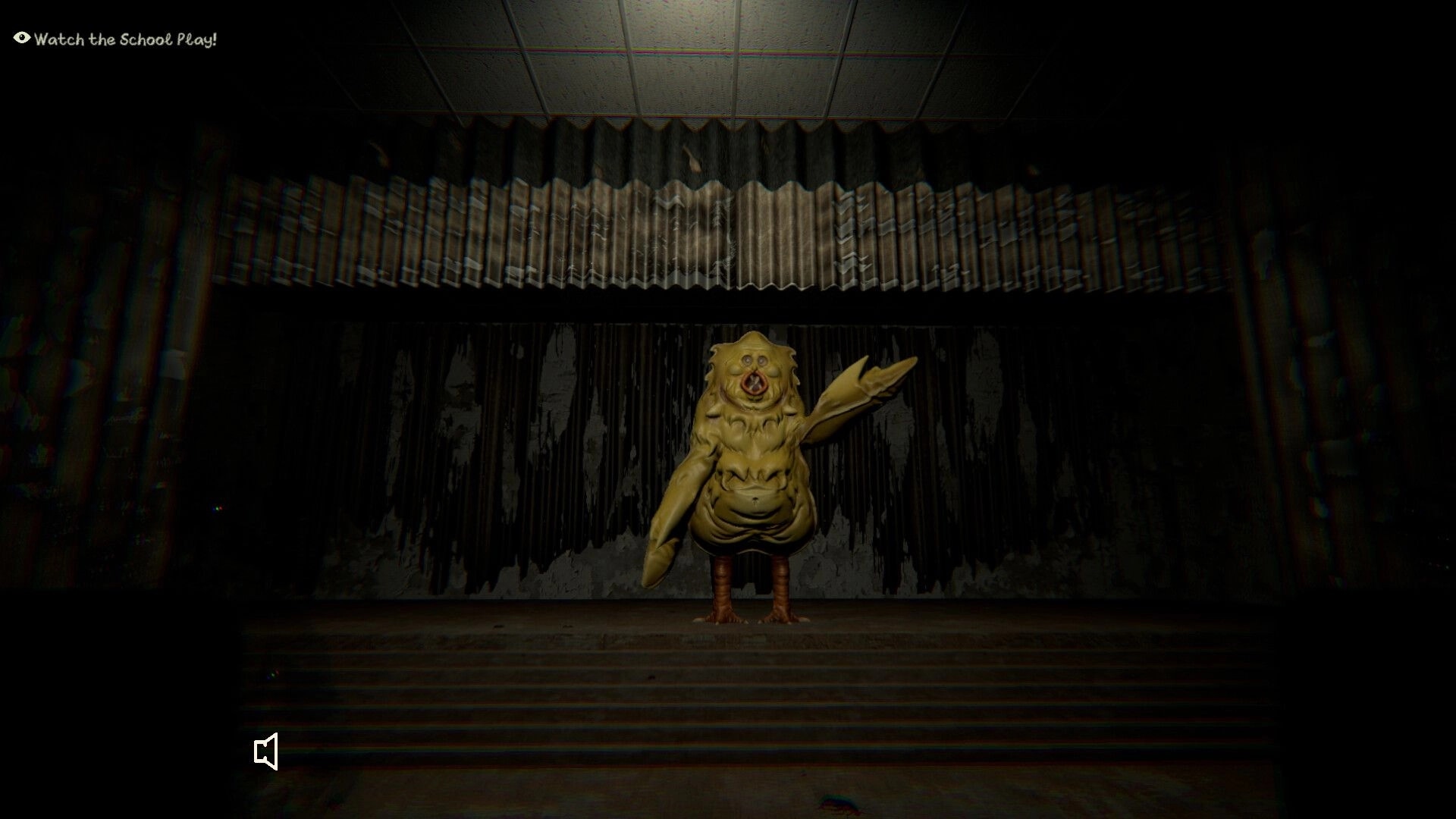Slumber Party: Giant yellow creature on stage in dark, eerie theater with tattered curtains