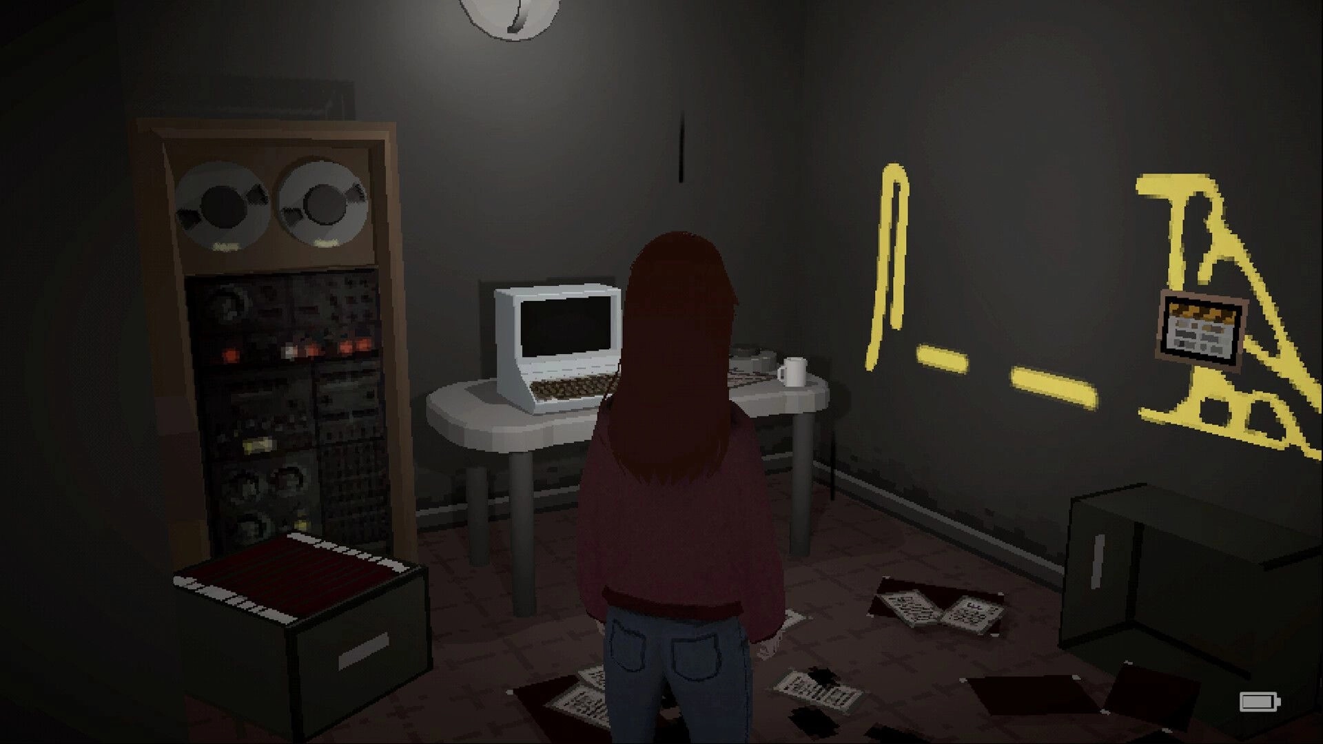 Solace Creek: Player faces a desk computer in dim office with tape reels, graffiti, and papers scattered.