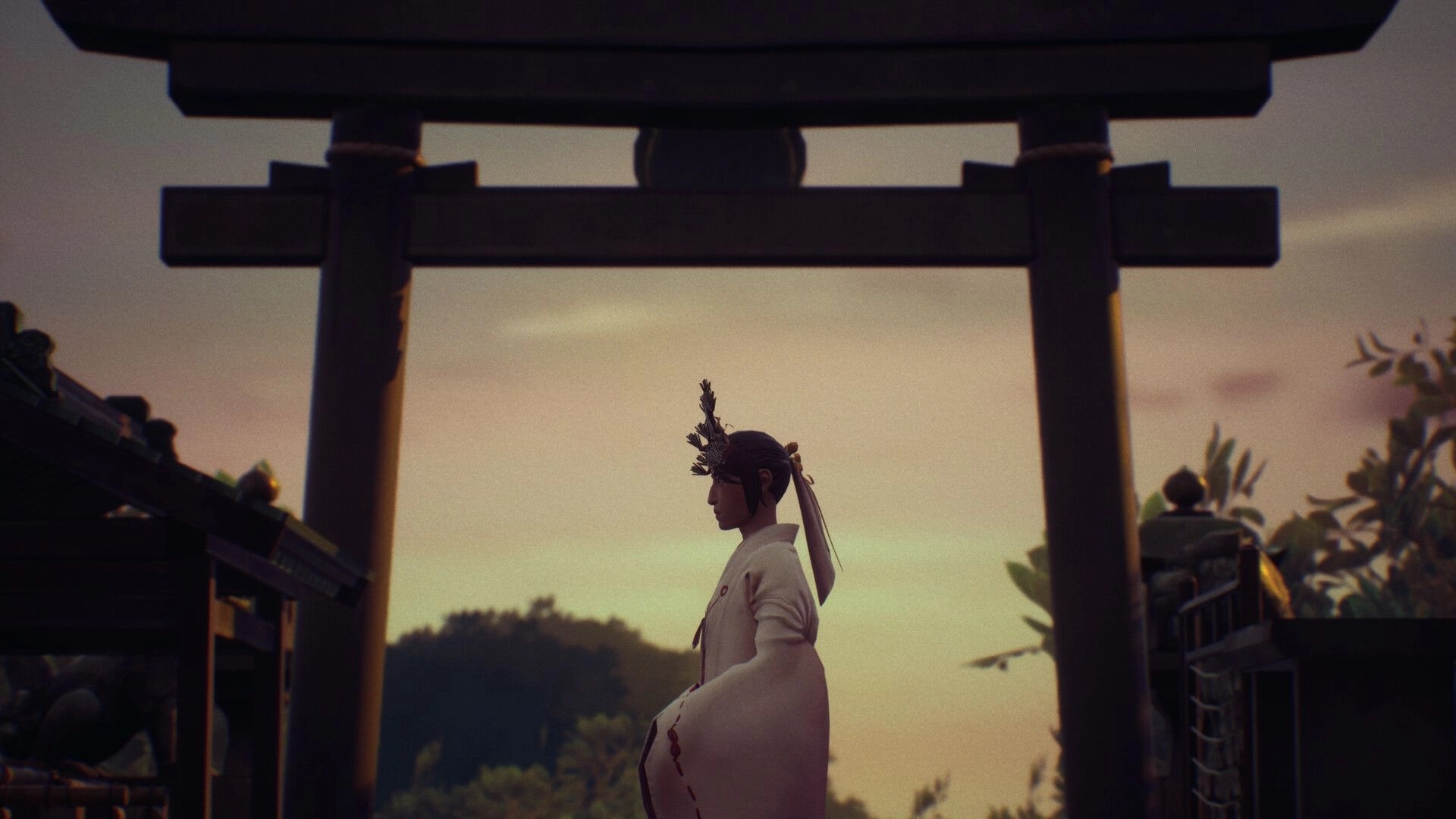 SOMBRAS: Side view of shrine maiden standing under a torii gate at sunset, village rooftops nearby.
