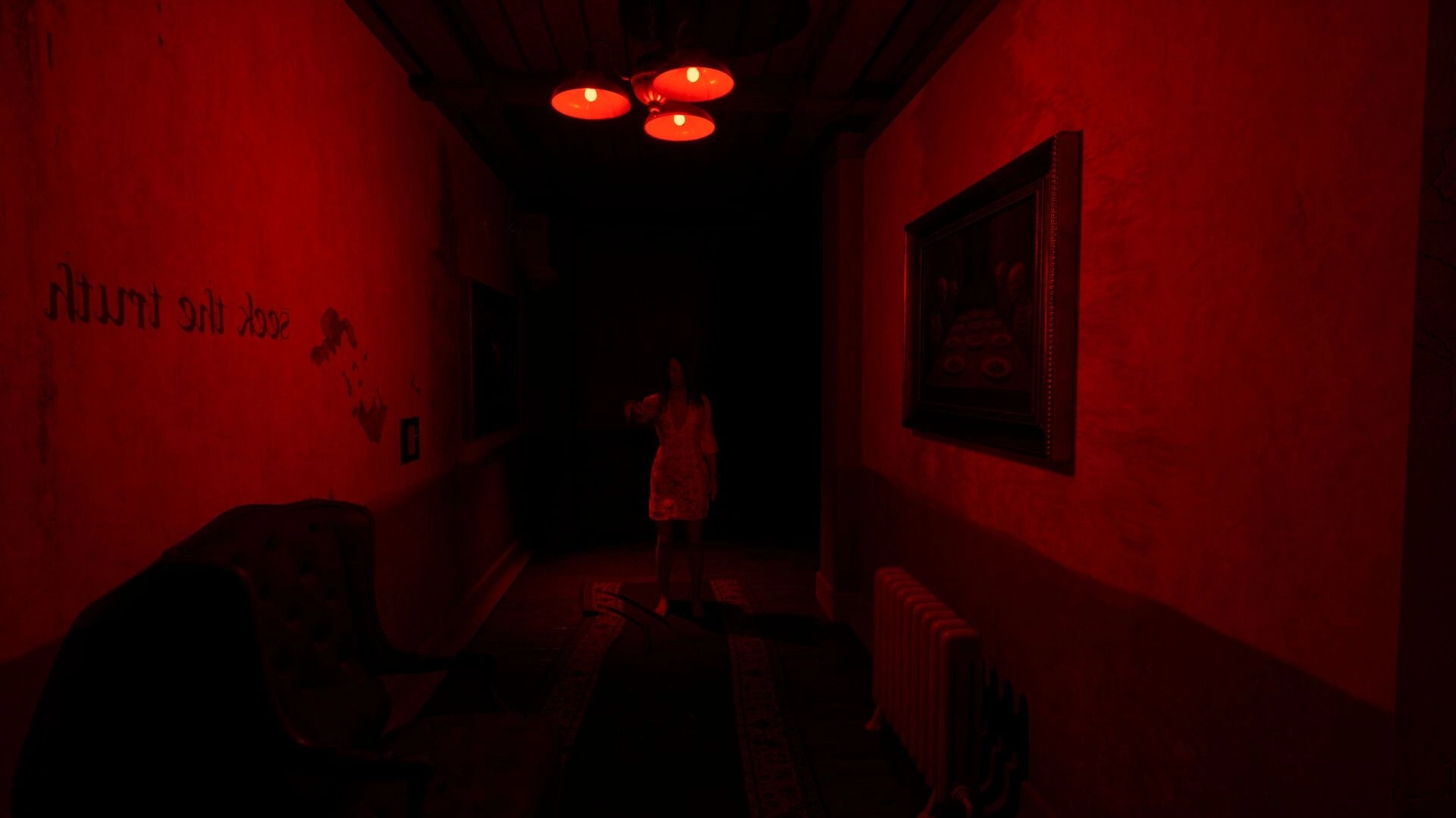 Spiritus Sancti: Shadowy woman blocks the corridor in a red-lit hallway with paintings and radiator.