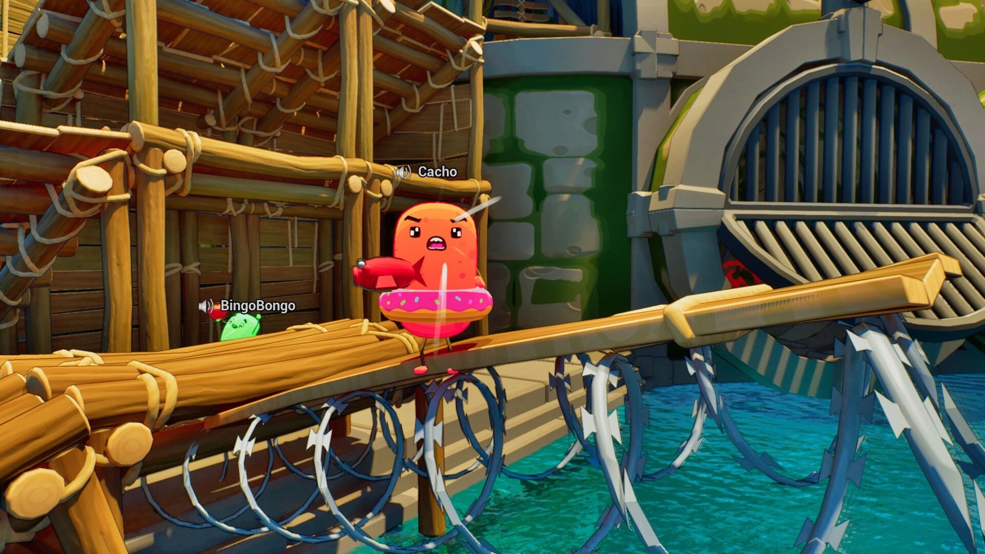 Sponge Break: Cacho balances on raft logs above barbed wire near a dam grate, co-op name tags visible.